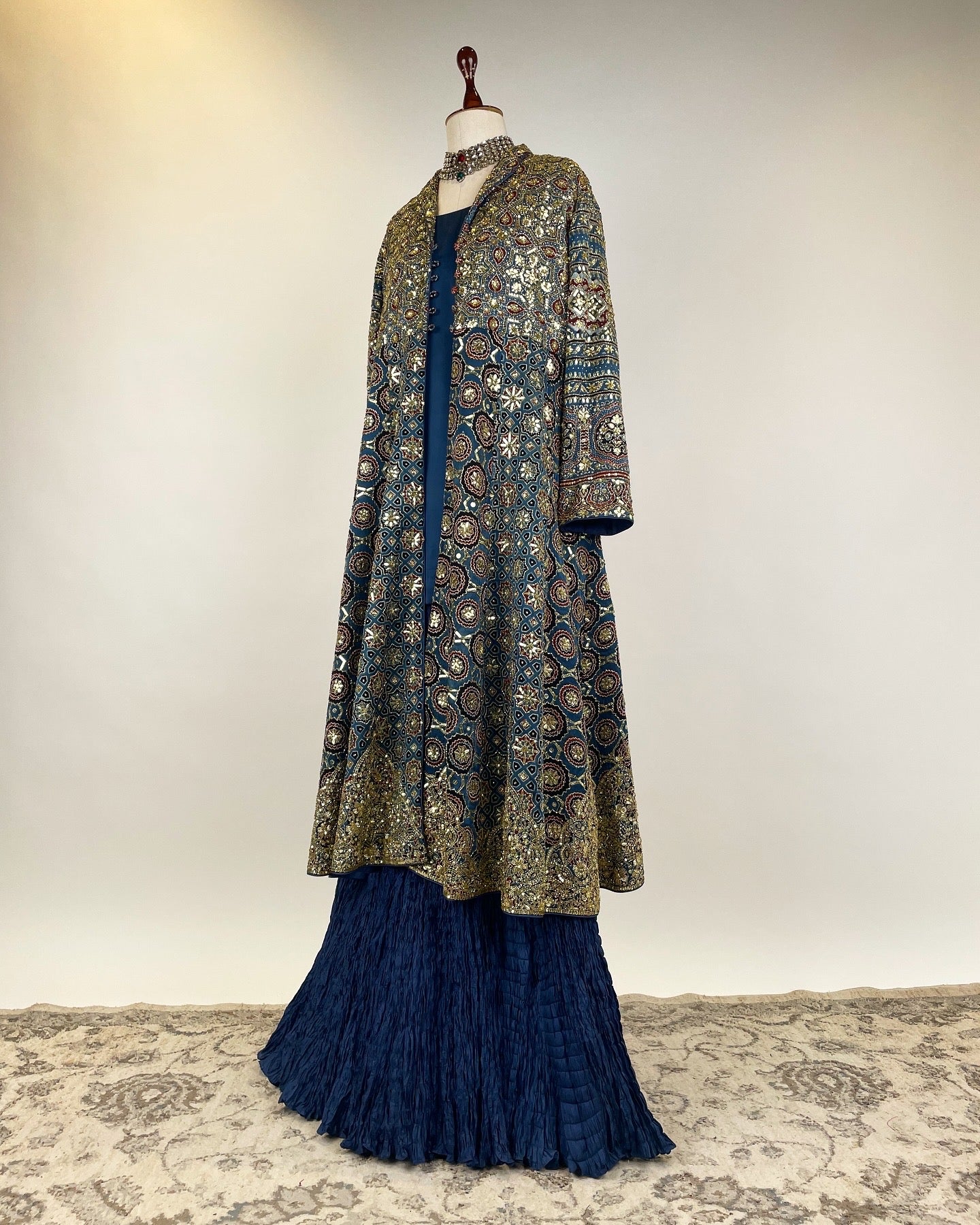 BLUE AJRAKH JACKET WITH ZARDOZI WORK PAIRED WITH CRUSHED SHARARA