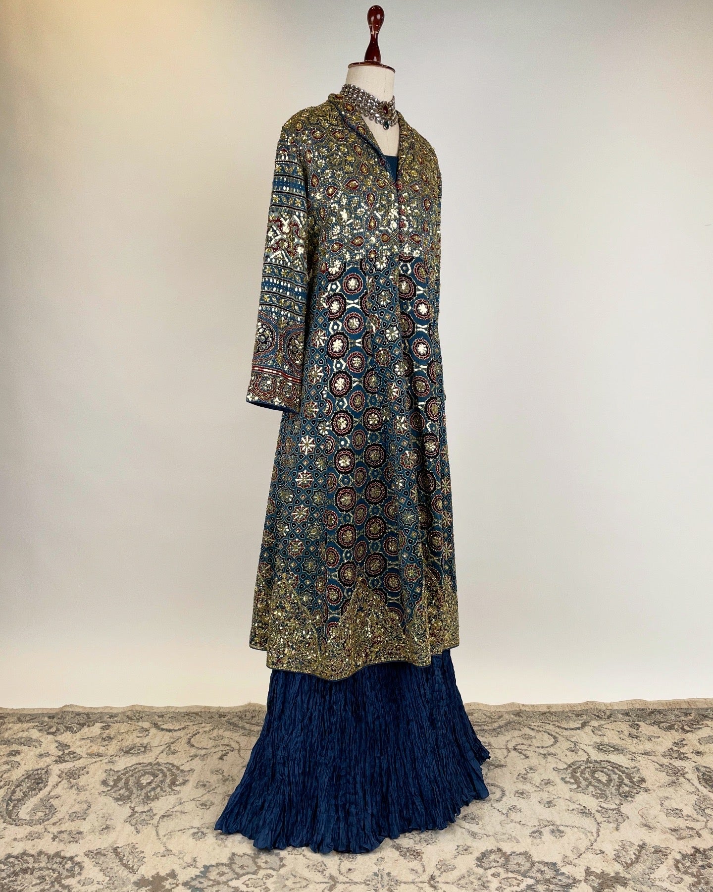BLUE AJRAKH JACKET WITH ZARDOZI WORK PAIRED WITH CRUSHED SHARARA