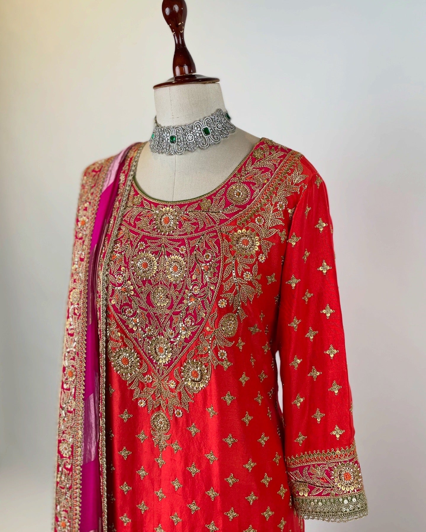 ORANGE SHORT KURTA WITH SILK SHARARA AND AN ORGANZA TISSUE DUPATTA