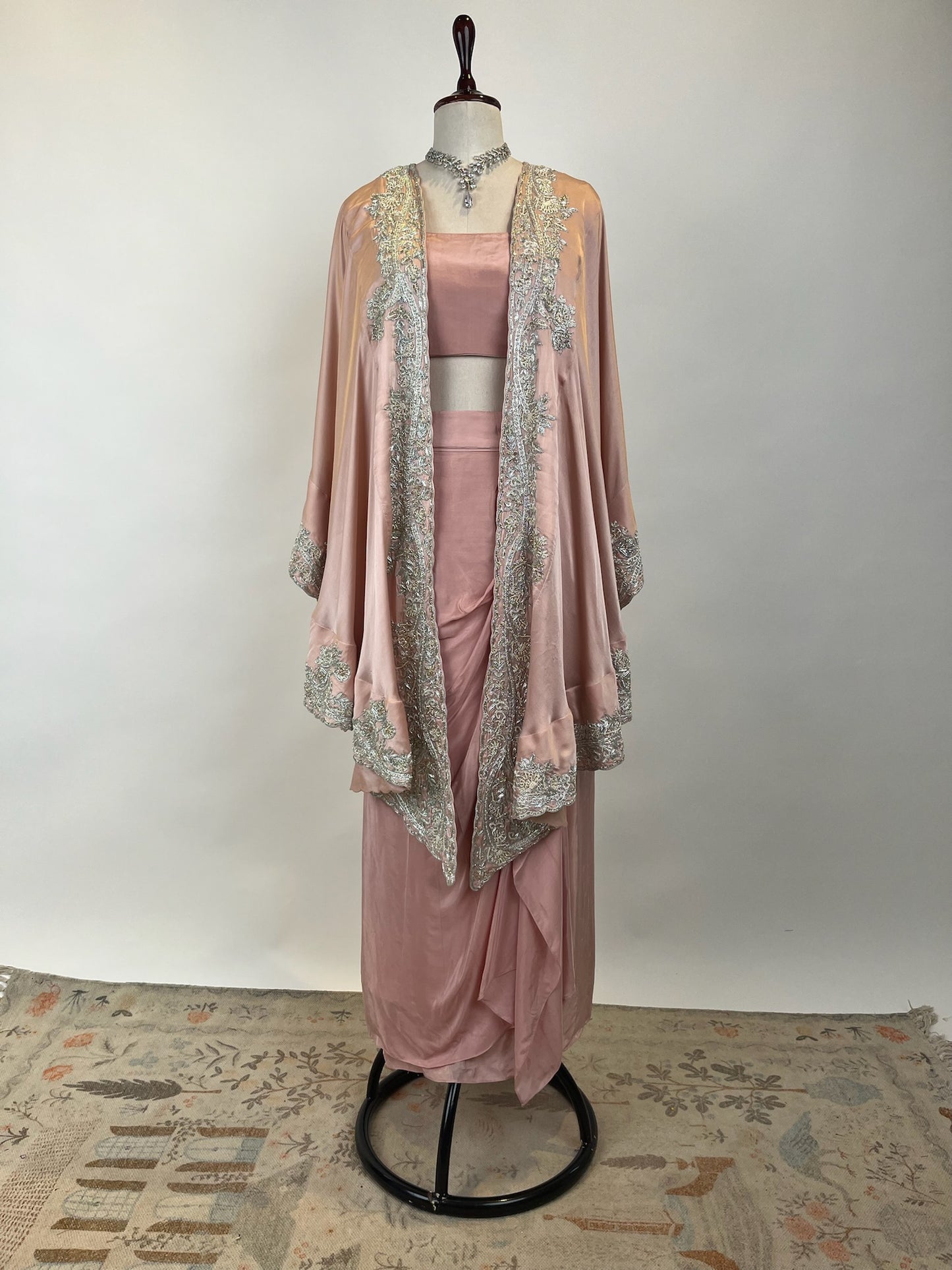 PINK CAPE WITH DRAPED SKIRT AND BLOUSE