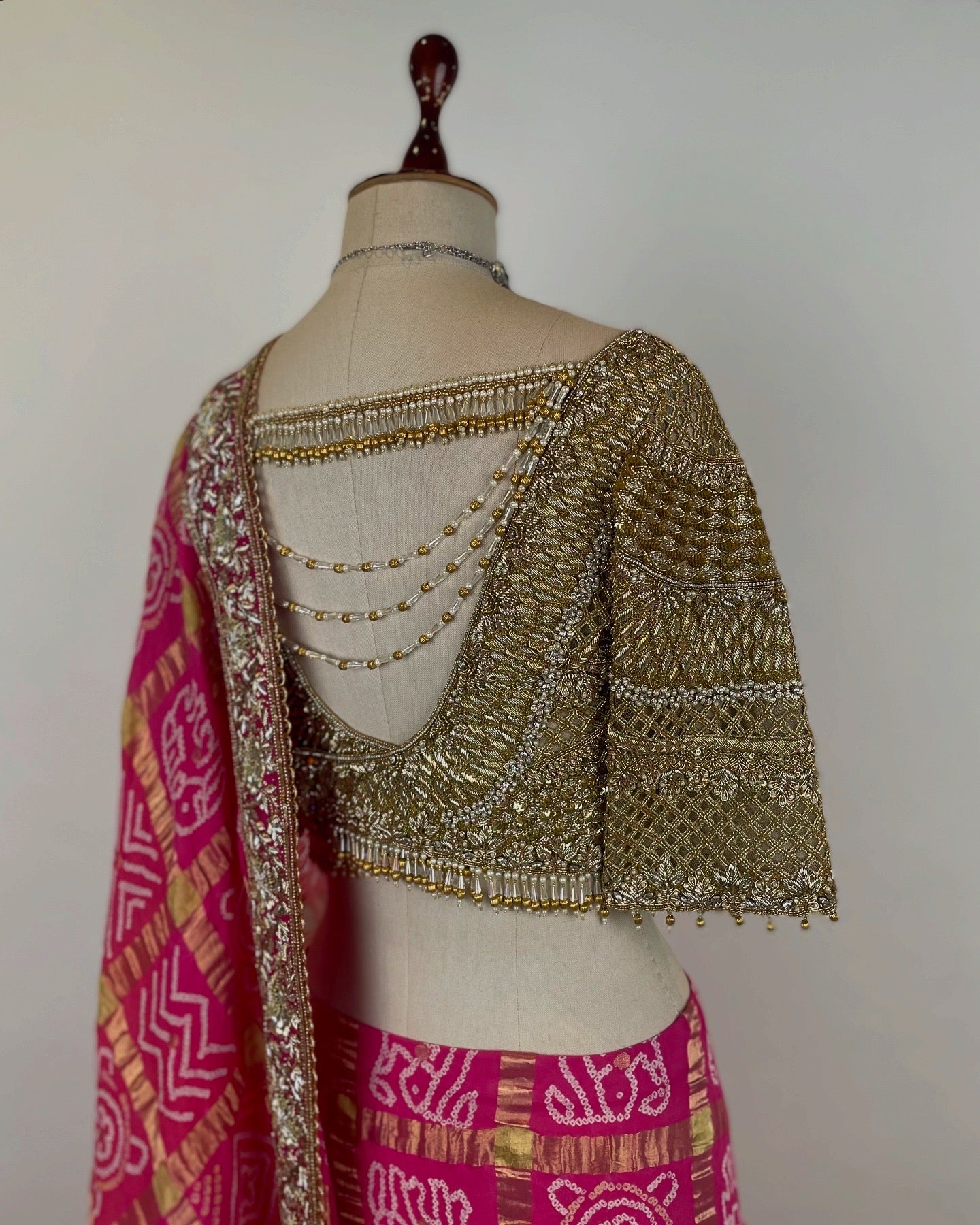PURE GOLD ZARI FUCHSIA GHARCHOLA SAREE WITH EMBELLISHED GOLDEN BLOUSE