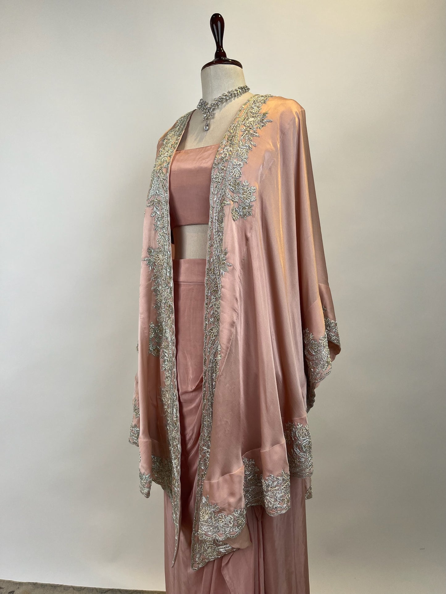 PINK CAPE WITH DRAPED SKIRT AND BLOUSE