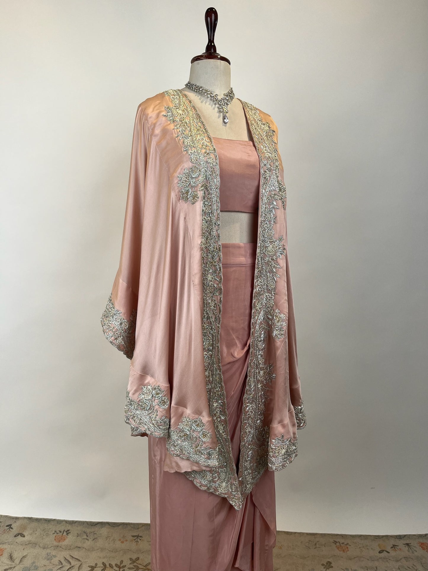PINK CAPE WITH DRAPED SKIRT AND BLOUSE