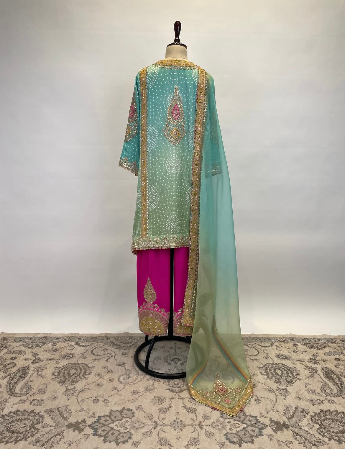 An Ombré Short A-Line Kurta With Salwar Ensemble Adorned In Bandhej, Gota, Marodi And Resham Embroidery
