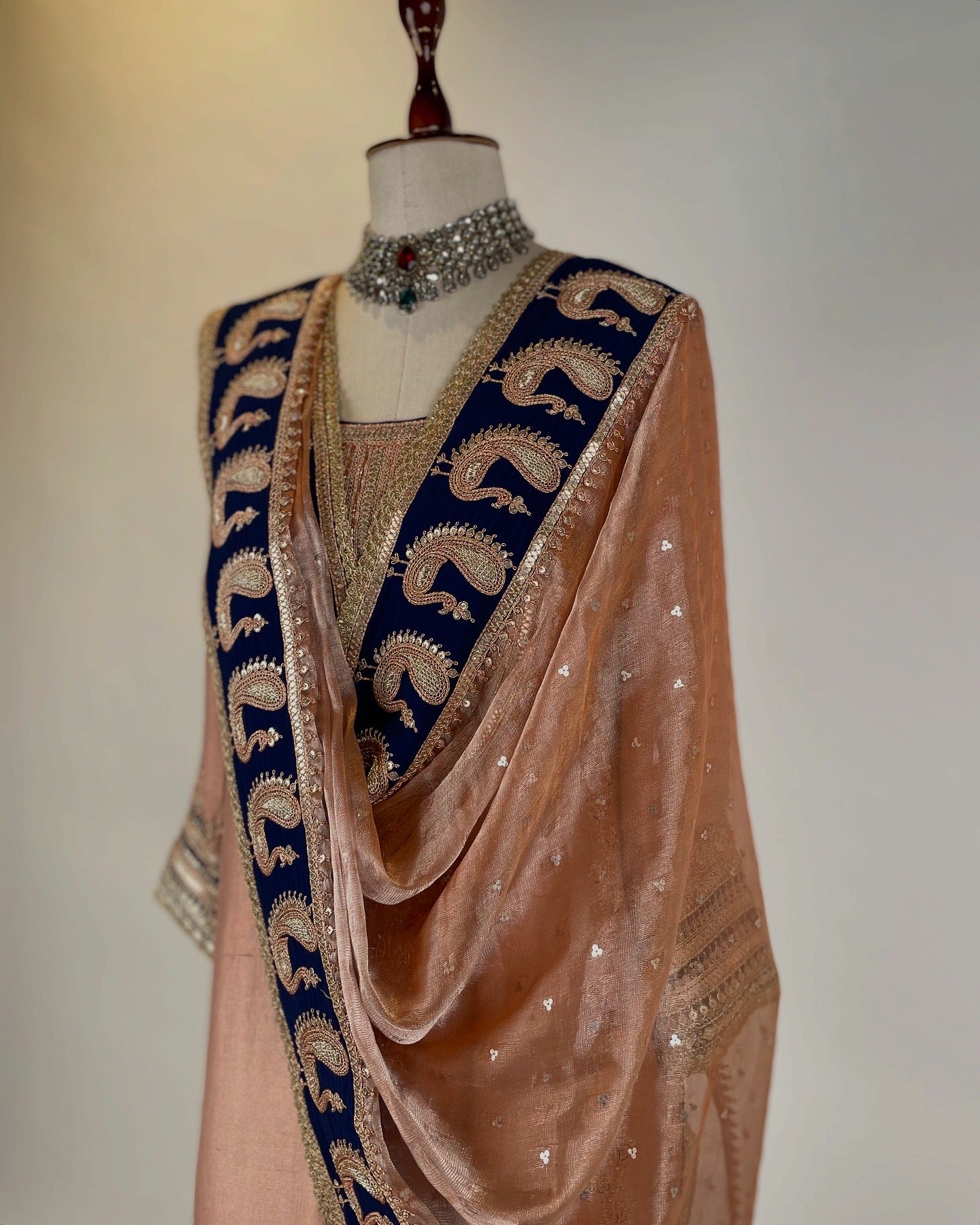 DEEP PEACH AND NAVY KURTA SET EMBELLISHED WITH BRASS MARODI EMBROIDERY