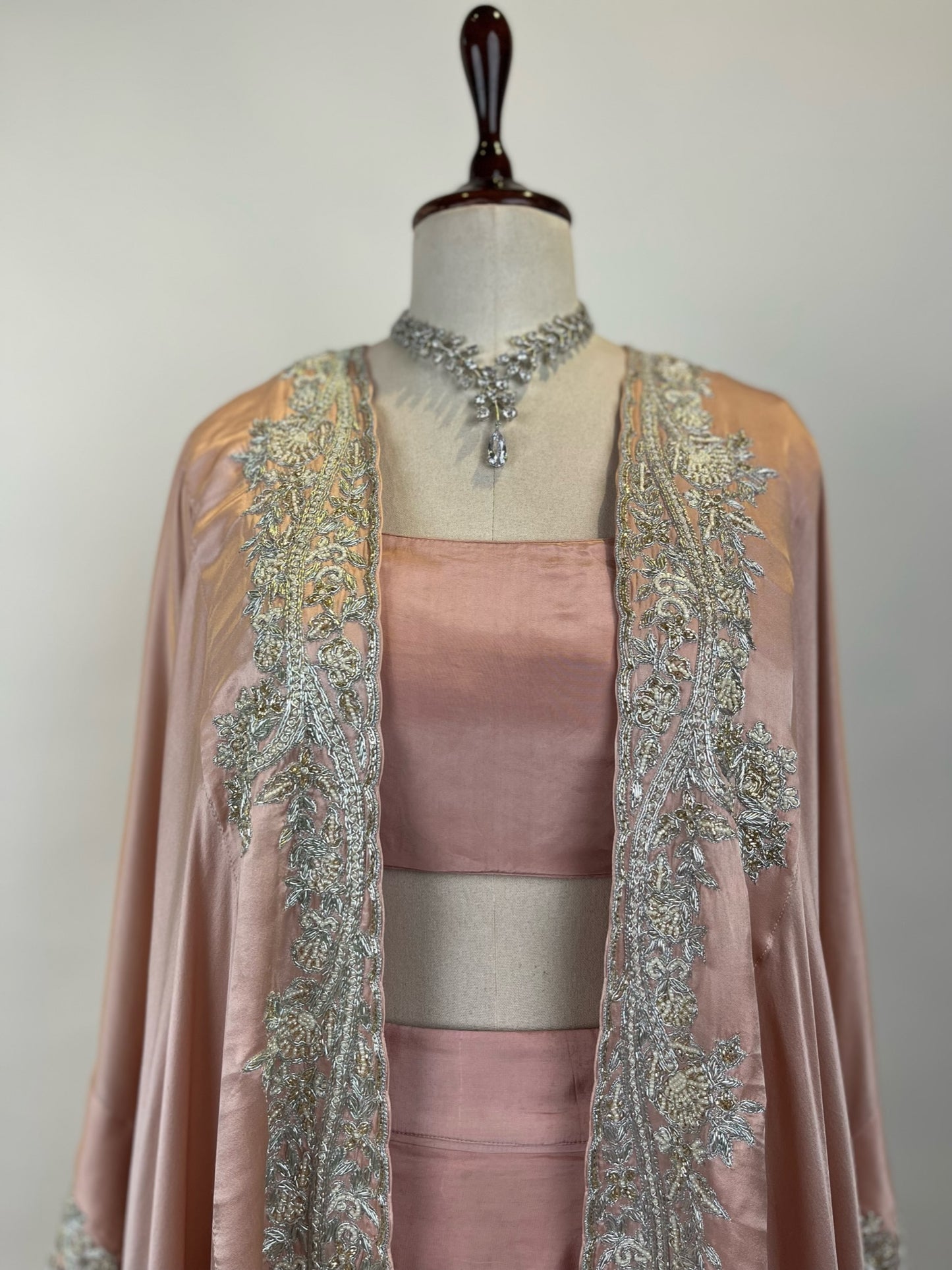PINK CAPE WITH DRAPED SKIRT AND BLOUSE