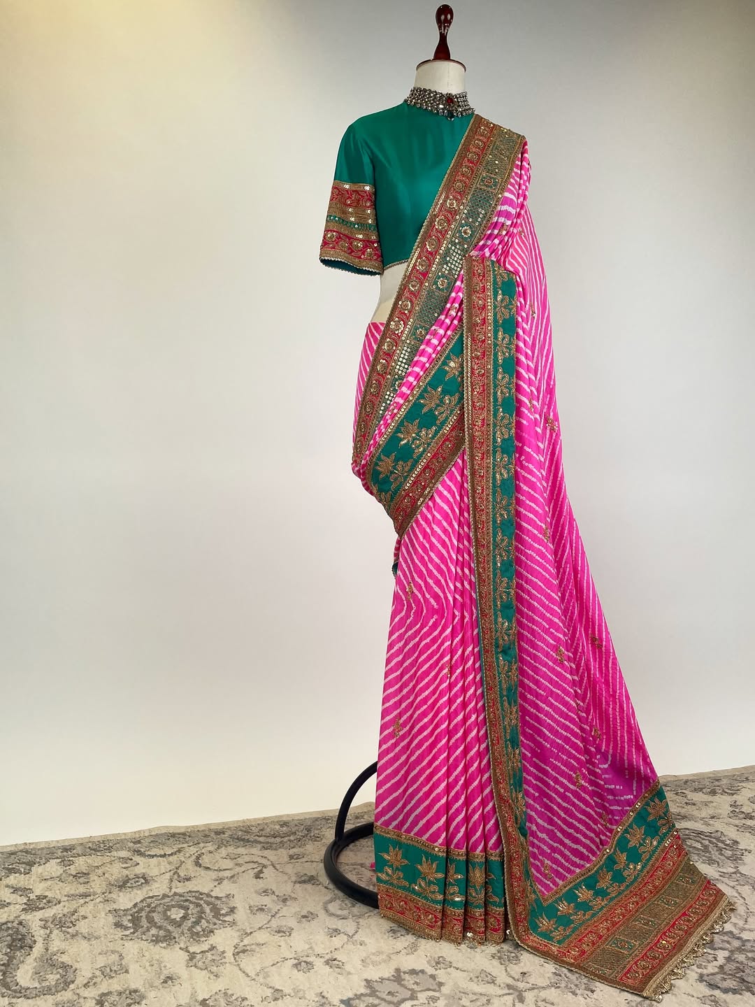 GREEN TEAL AND FUCHSIA PINK LEHERIYA RAI BANDHEJ GEORGETTE SAREE IN HERITAGE BRASS MARODI WORK