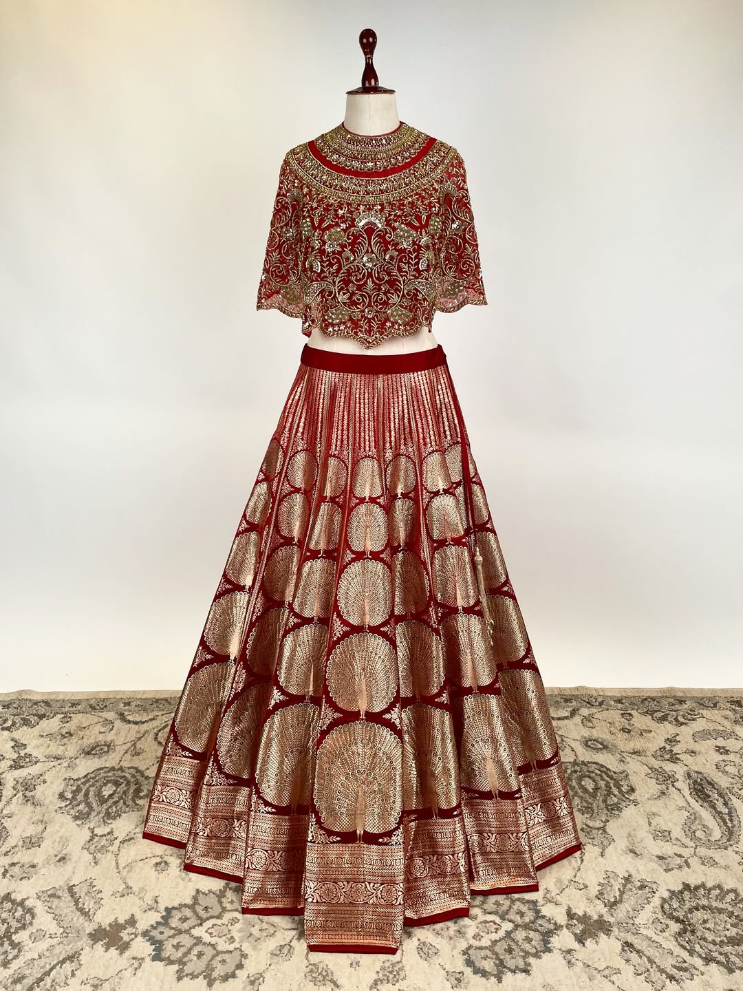 MASHRU SILK HANDLOOM KADWA WEAVE LEHENGA WITH MEENAKARI PAIRED WITH AN EMBROIDERED SHORT CAPE TOP