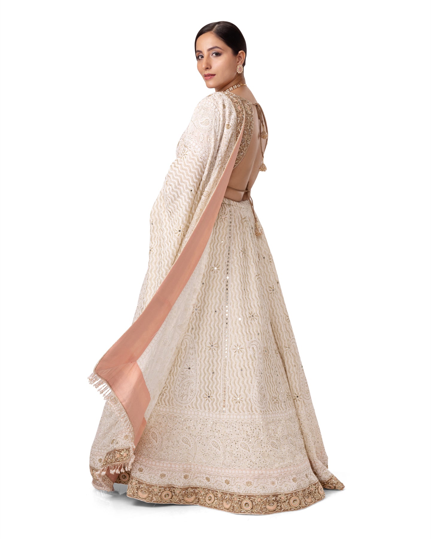 OFF WHITE PASTEL CHIKANKARI- ZARDOSI LEHENGA WITH BACKLESS ZARDOSI BLOUSE