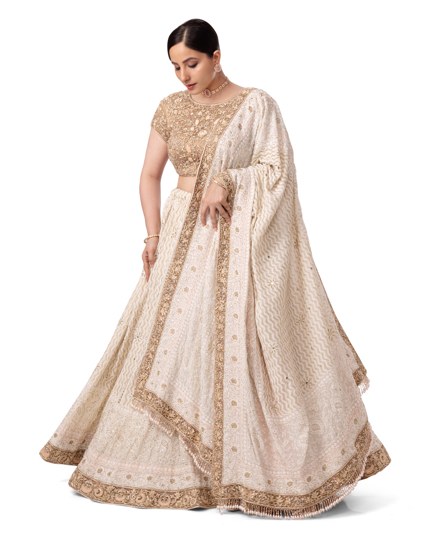 OFF WHITE PASTEL CHIKANKARI- ZARDOSI LEHENGA WITH BACKLESS ZARDOSI BLOUSE