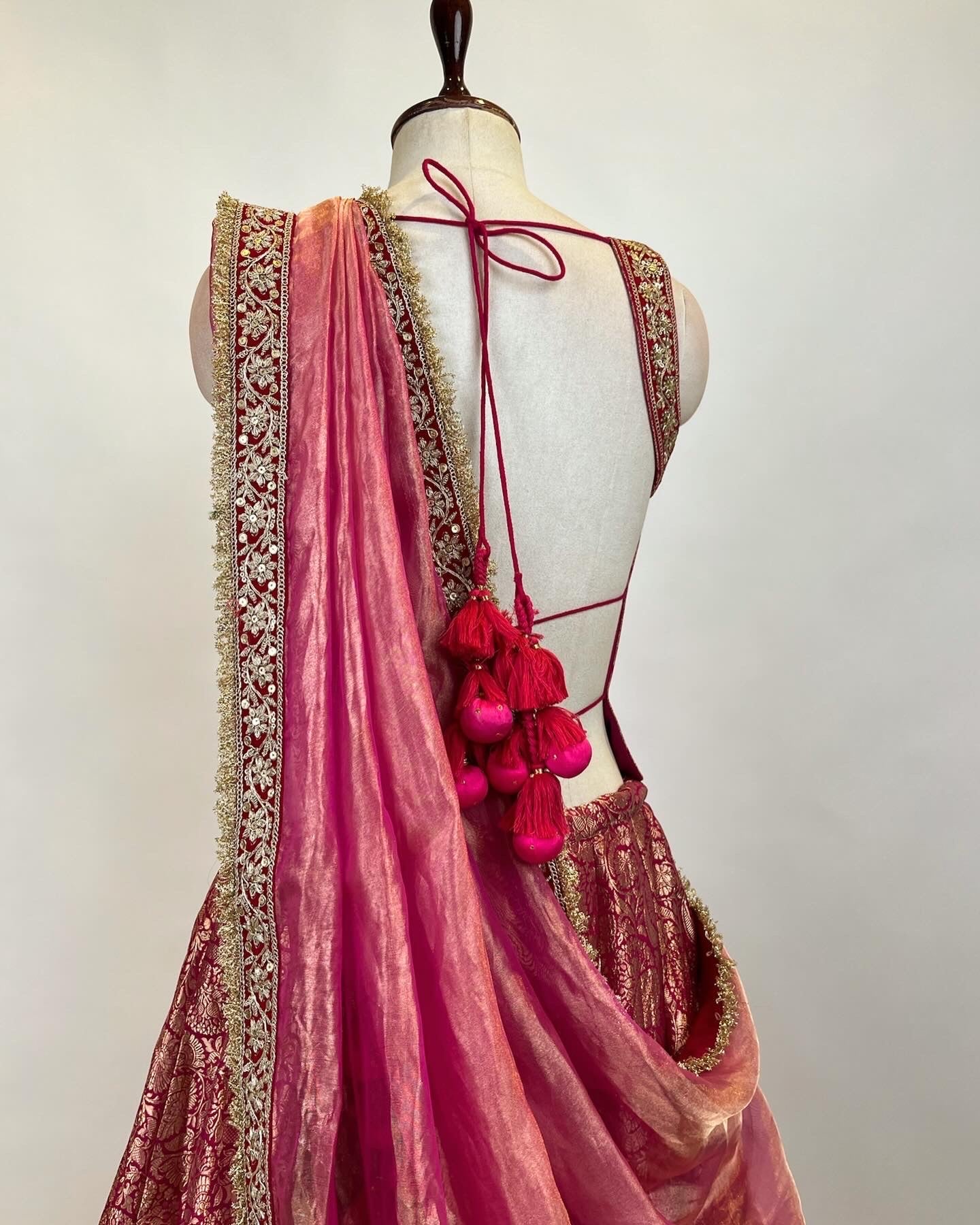 BROCADE LEHENGA WITH BACKLESS TASSLED TOP