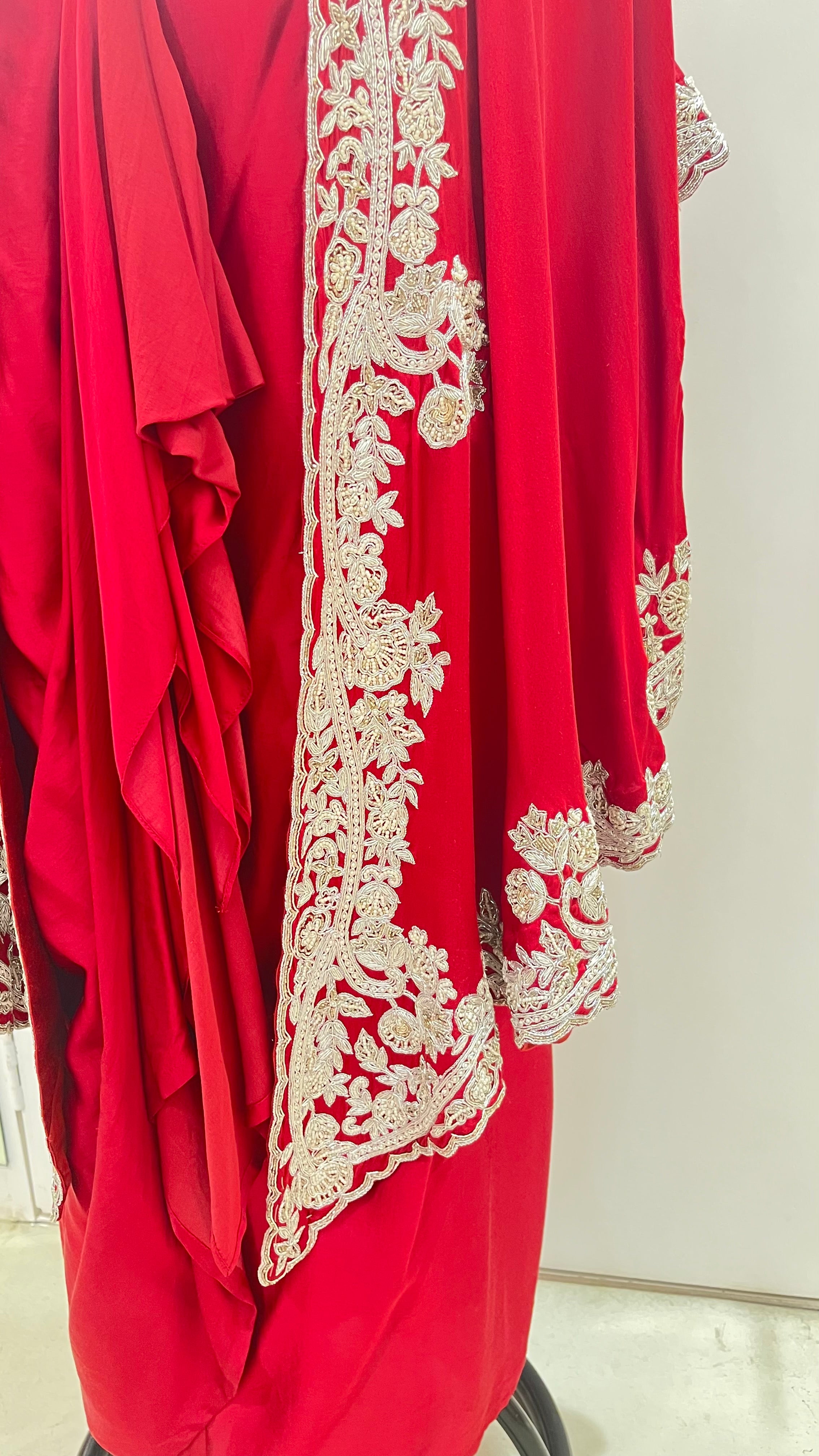 RED CAPE WITH DRAPED SKIRT AND BLOUSE