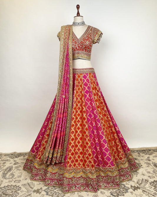 Pink Orange Rai Bandhej Benarasi Embroidered Lehenga with Radha Krisha Themed Dupatta