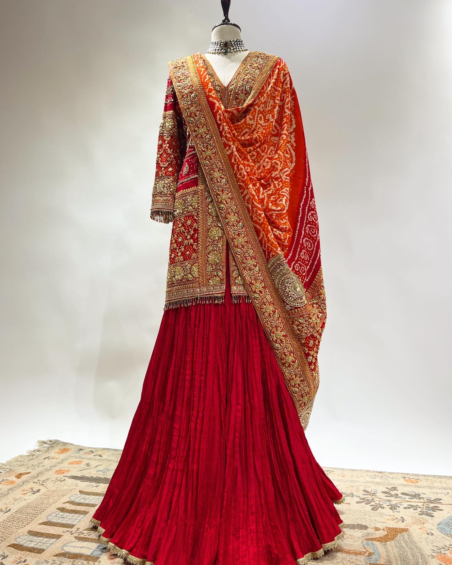 RED BANDHEJ  ON BANDHEJ SHARARA SET IN ZARDOSI & RESHAM WORK EMBROIDERY