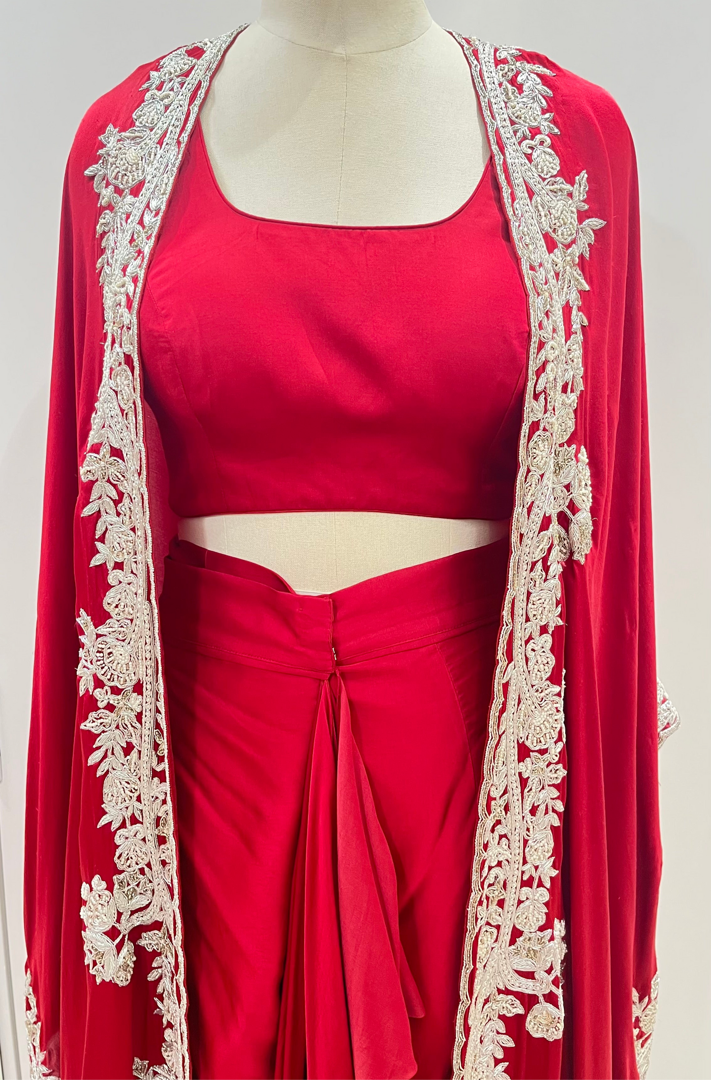 RED CAPE WITH DRAPED SKIRT AND BLOUSE