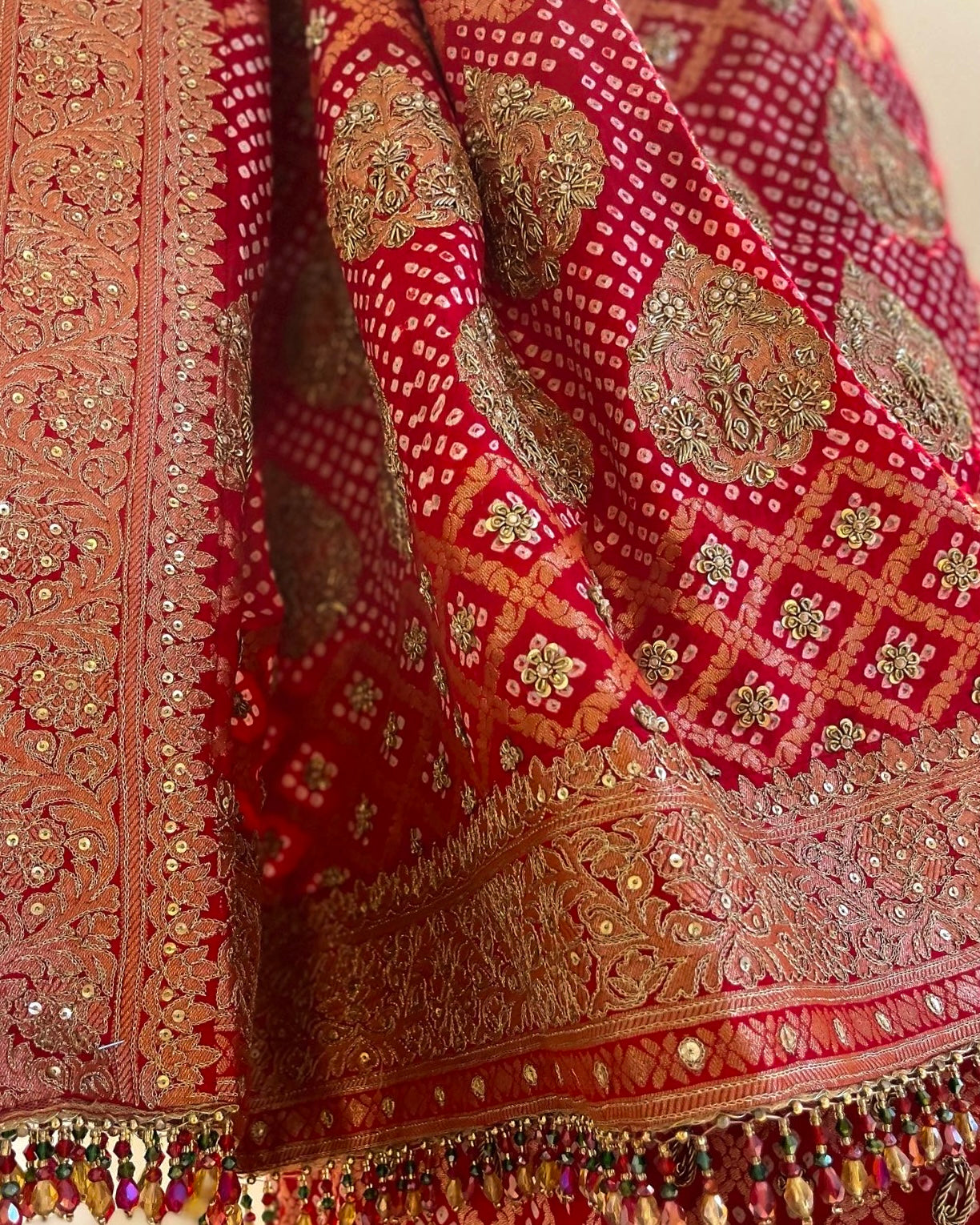 RED PURE ZARI RAI BANDHEJ BANARASI BANDHANI SAREE WITH MARODI & ZARDOSI WORK