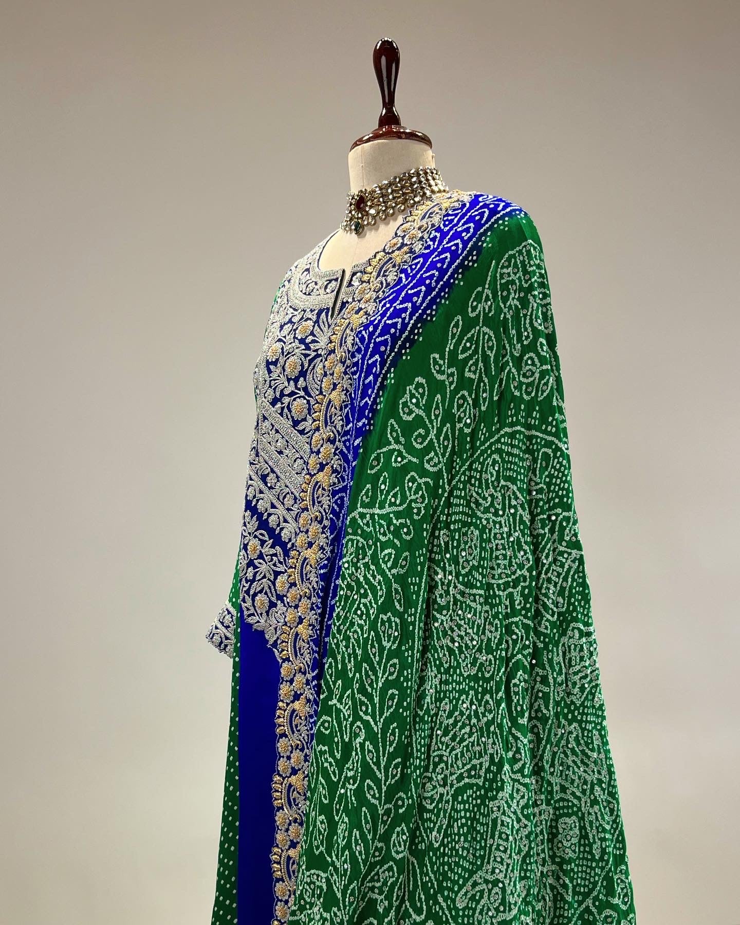 ROYAL BLUE & EMERALD GREEN AABHA ENSEMBLE IN SILVER MARODI & BANDHEJ WORK