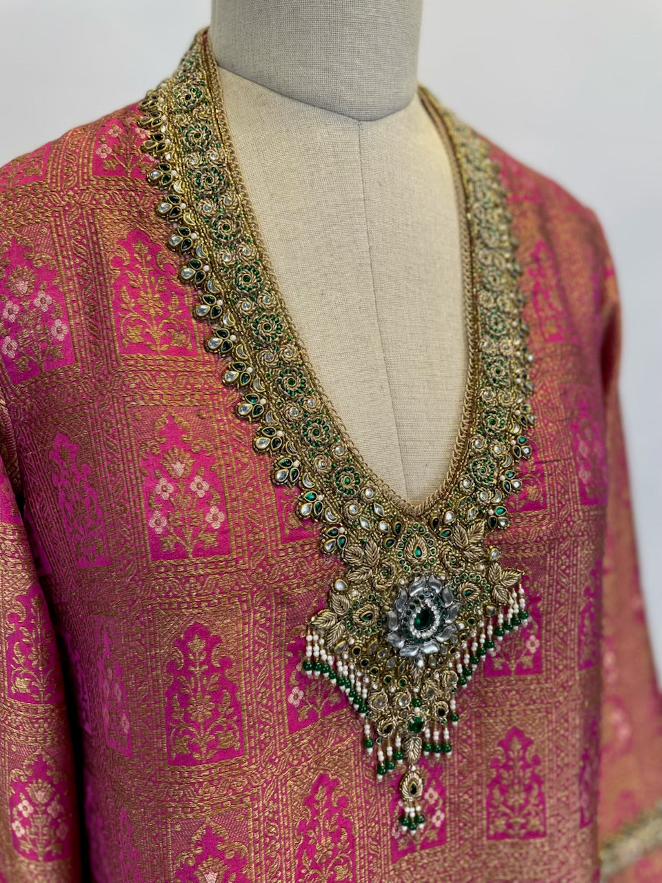 Banarasi Brocade Kurta Set Adorned With Intricate Zardosi And Emerald Detailing.
