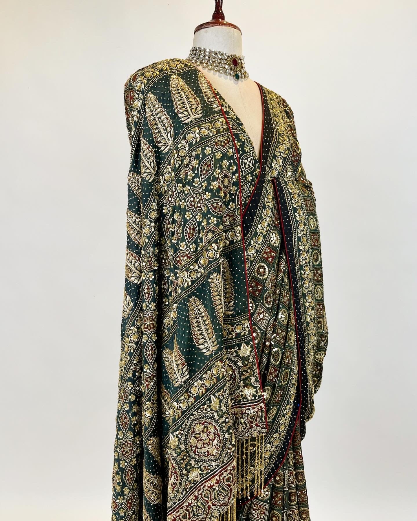 Gharchola inspired Deep Green Ajrakh Saree in Zardosi and Aari work