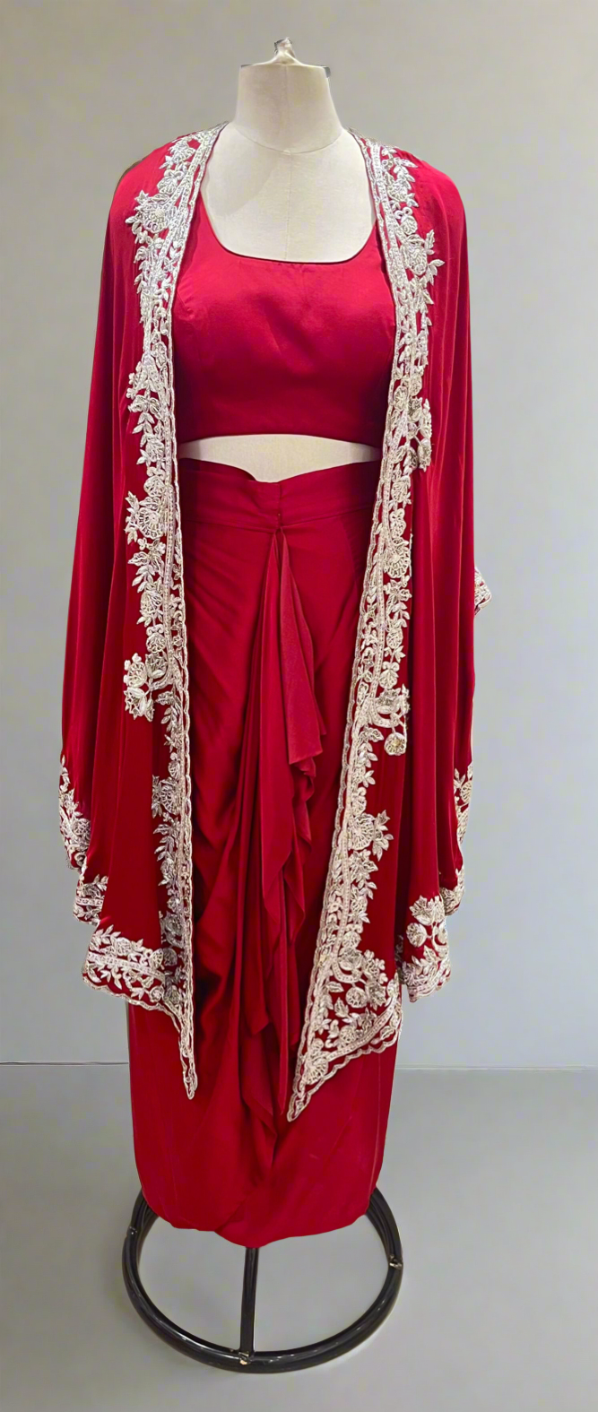 RED CAPE WITH DRAPED SKIRT AND BLOUSE