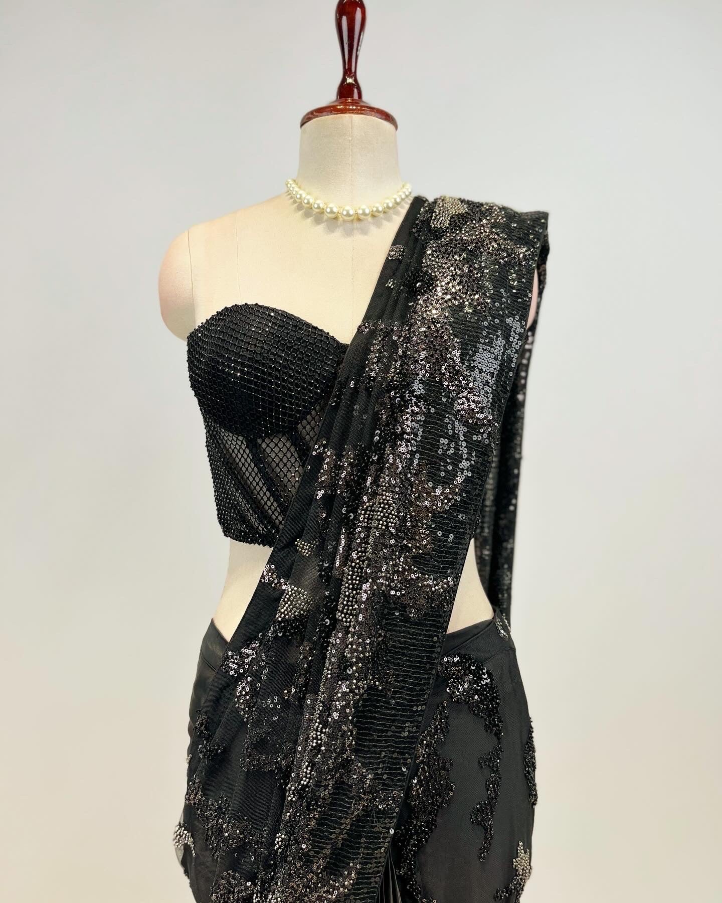 PRE- DRAPED SHIMMER SEQUIN SAREE WITH A STONE STUDDED CORSET