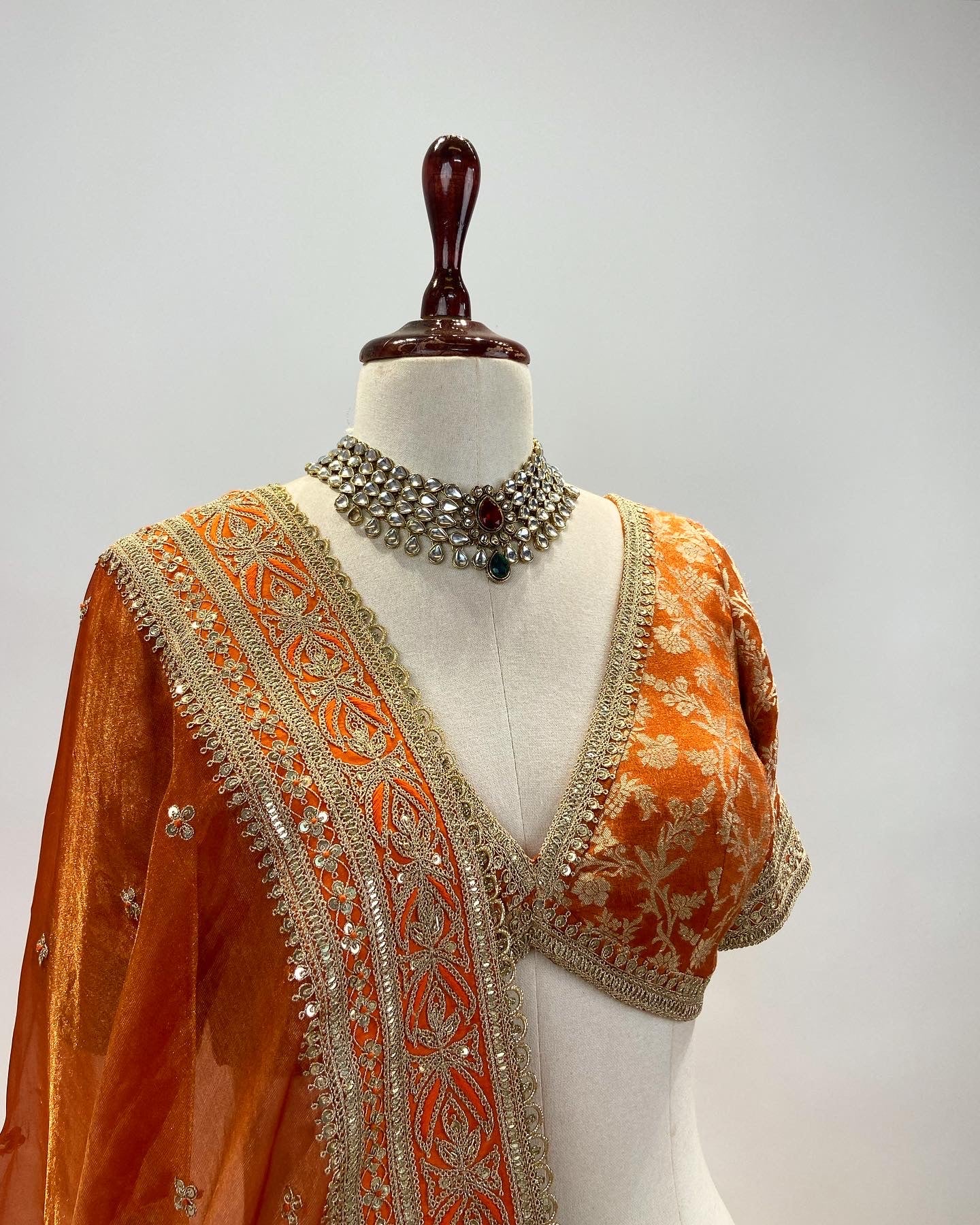 KADWA BROCADE LEHENGA IN RUST ORANGE WITH MARODI WORK