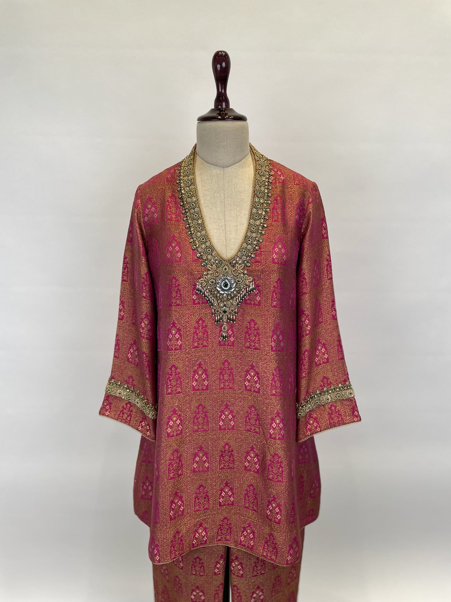 Banarasi Brocade Kurta Set Adorned With Intricate Zardosi And Emerald Detailing.