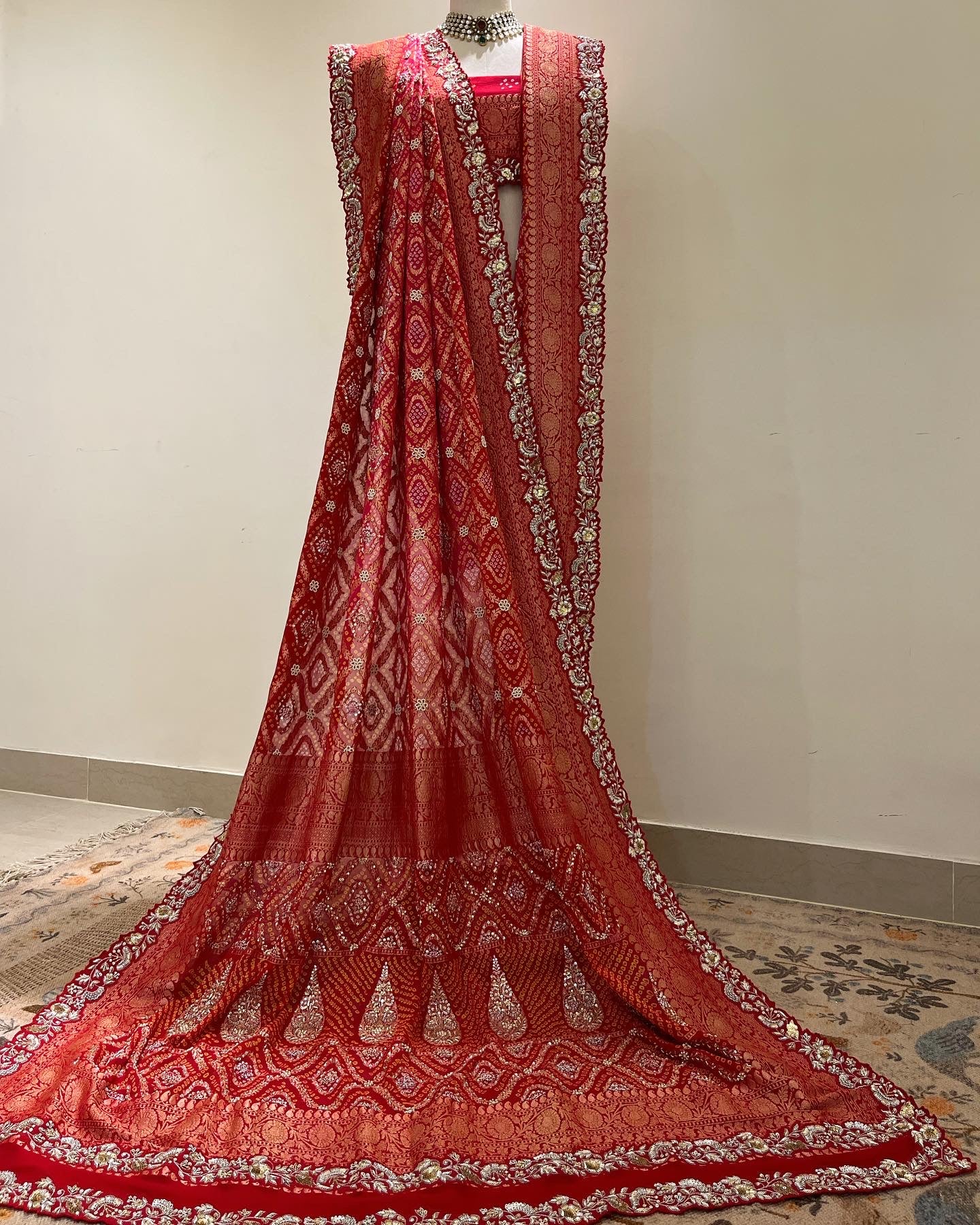 RED ZARDOSI CUTWORK EDGED RAI BANDHEJ SAREE