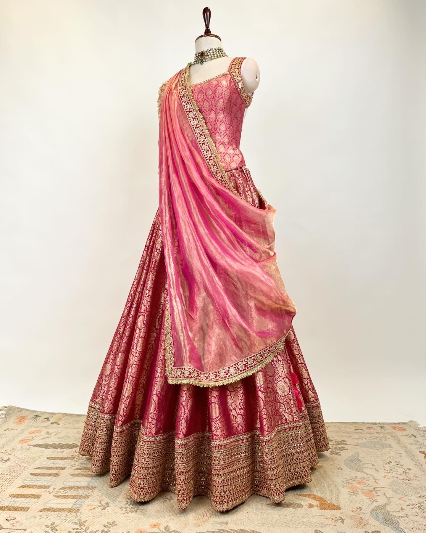 BROCADE LEHENGA WITH BACKLESS TASSLED TOP