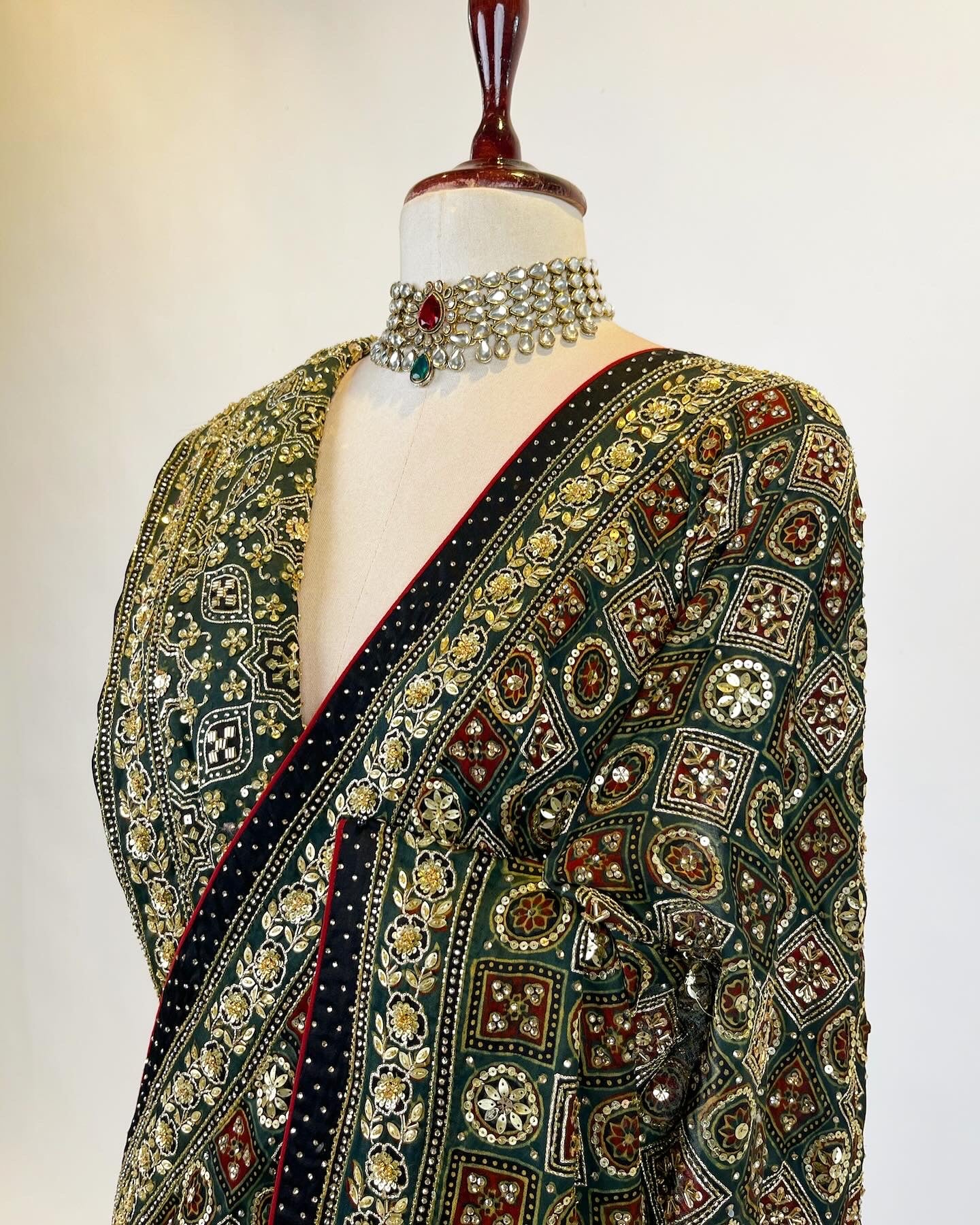 Gharchola inspired Deep Green Ajrakh Saree in Zardosi and Aari work