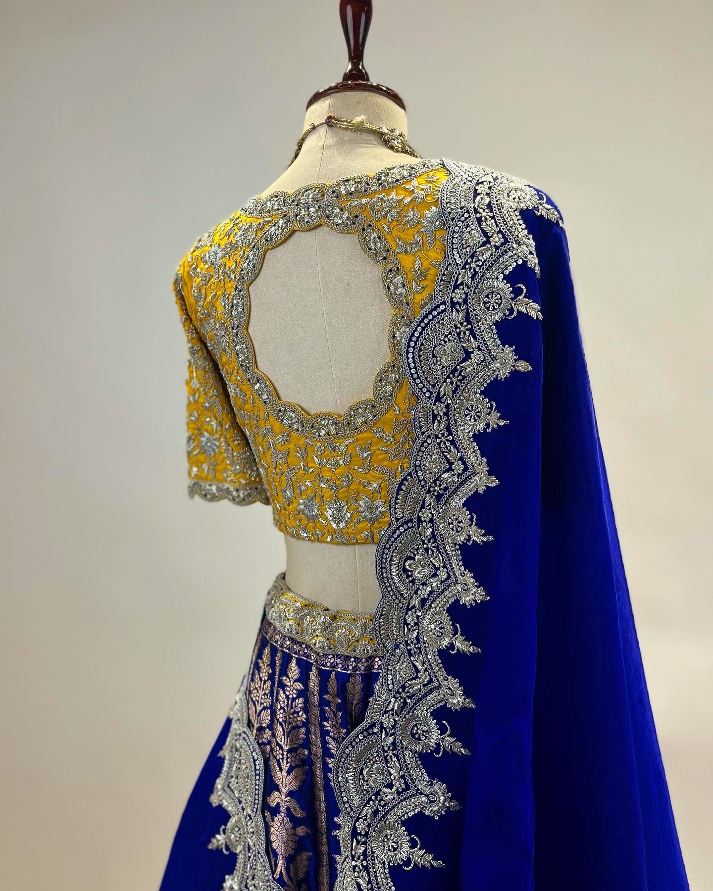 OCHRE & ROYAL BLUE HANDWOVEN BANARASI LEHENGA IN PURE HANDLOOM KADWA WORK