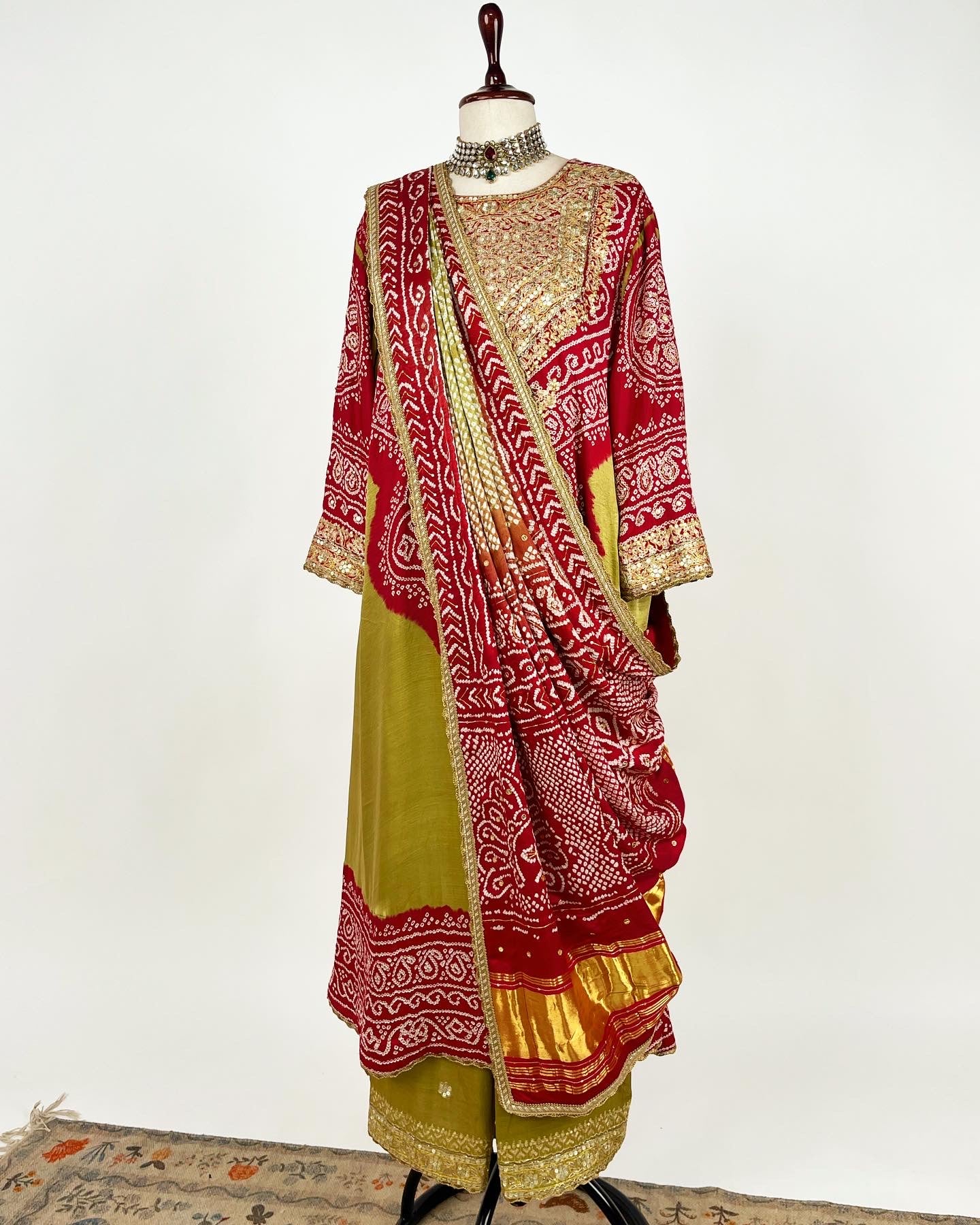 HENNA GREEN AABHA SET WITH RED BANDHEJ & EKTAAR EMBROIDERY