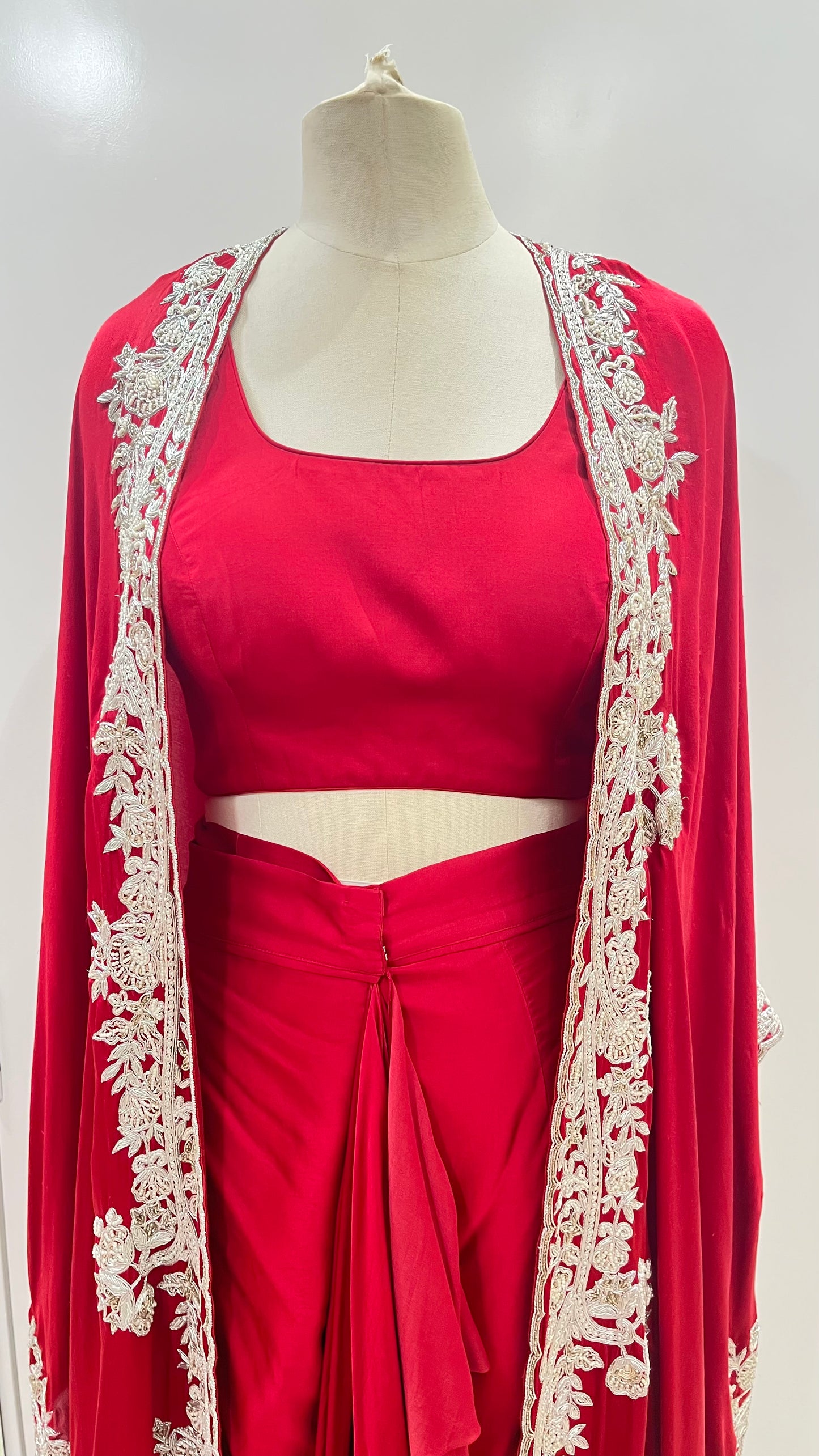 RED CAPE WITH DRAPED SKIRT AND BLOUSE