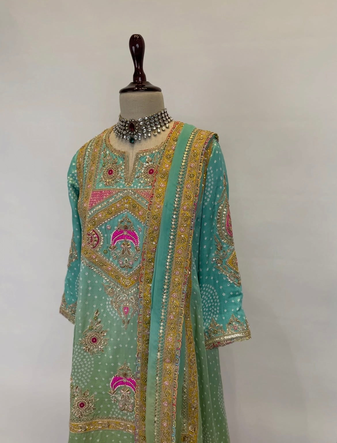 An Ombré Short A-Line Kurta With Salwar Ensemble Adorned In Bandhej, Gota, Marodi And Resham Embroidery