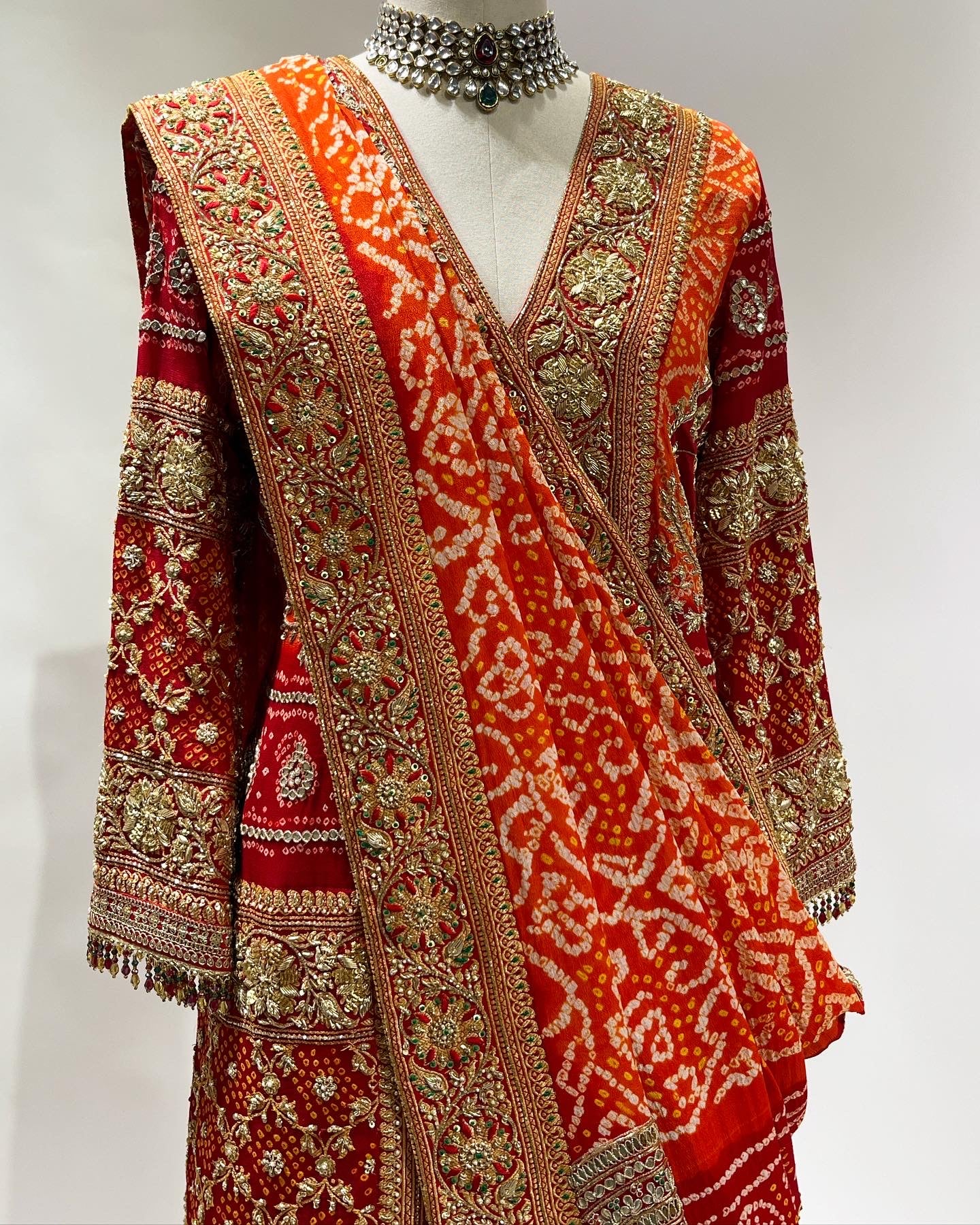 RED BANDHEJ  ON BANDHEJ SHARARA SET IN ZARDOSI & RESHAM WORK EMBROIDERY