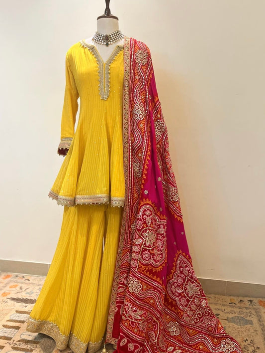 YELLOW KALIDAAR PEPLUM KURTA & SHARARA WITH BANDHANI GOTAPATTI DUPATTA