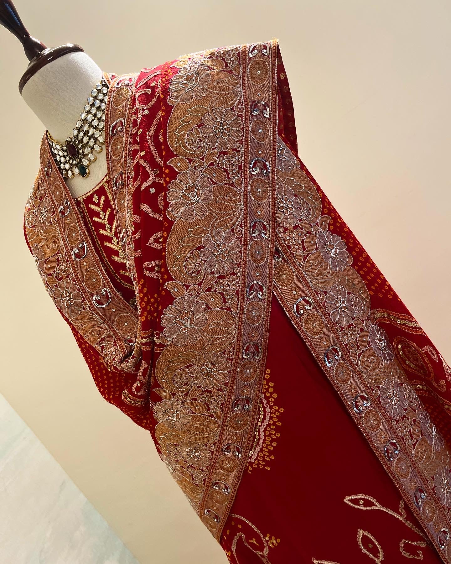 RED PICHWAI AABHA WITH EMBROIDERED RAI BANDHEJ DUPATTA