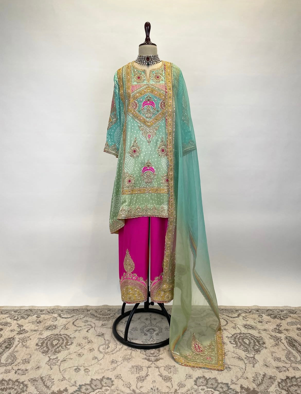 An Ombré Short A-Line Kurta With Salwar Ensemble Adorned In Bandhej, Gota, Marodi And Resham Embroidery