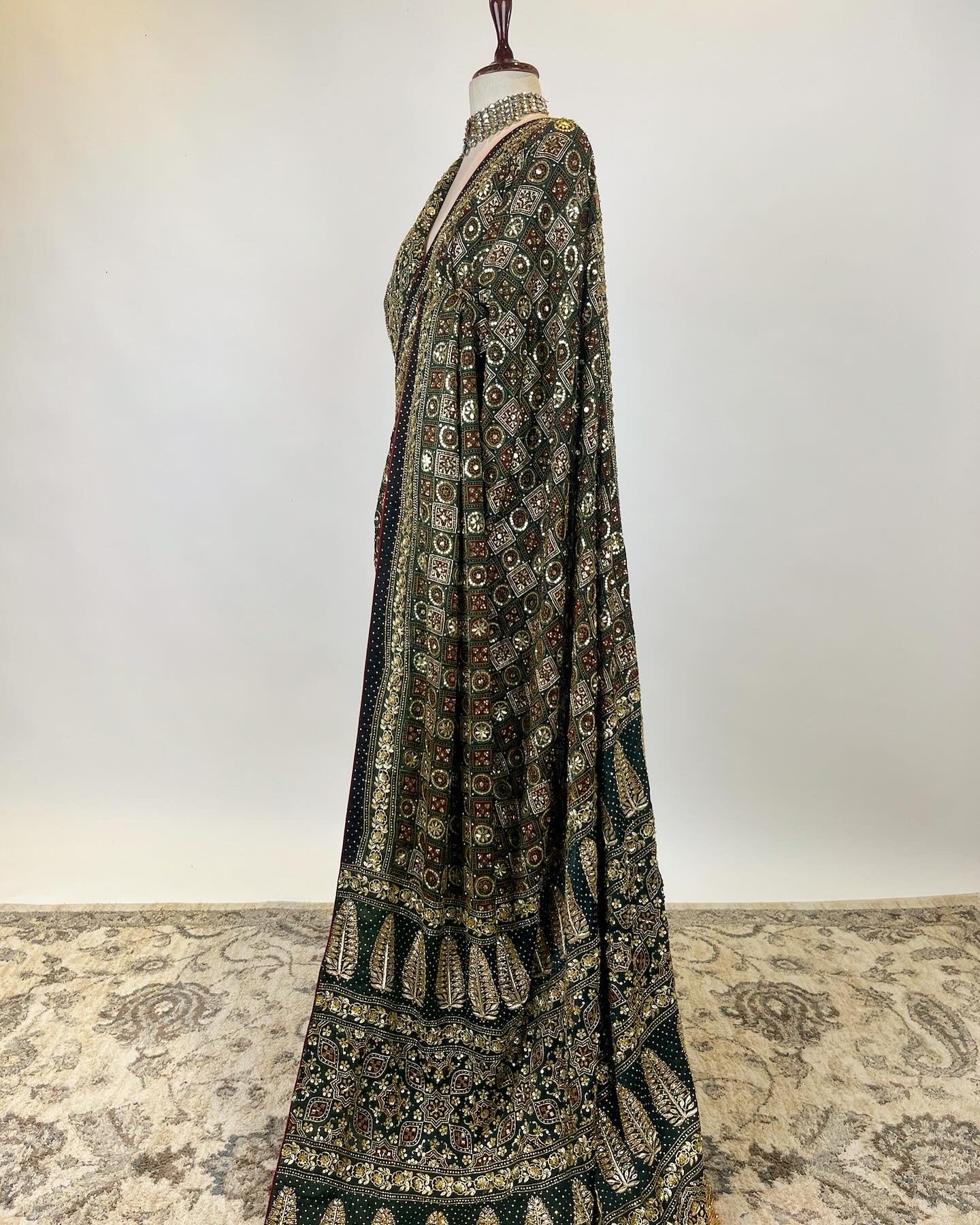 Gharchola inspired Deep Green Ajrakh Saree in Zardosi and Aari work