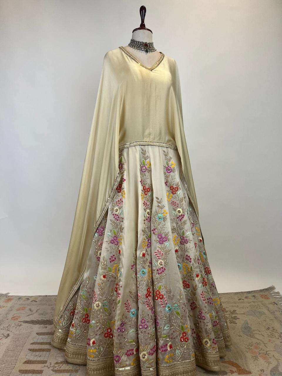 BEIGE CAPE TOP WITH FLORAL RESHAM-MARODI EMBROIDERED LEHENGA