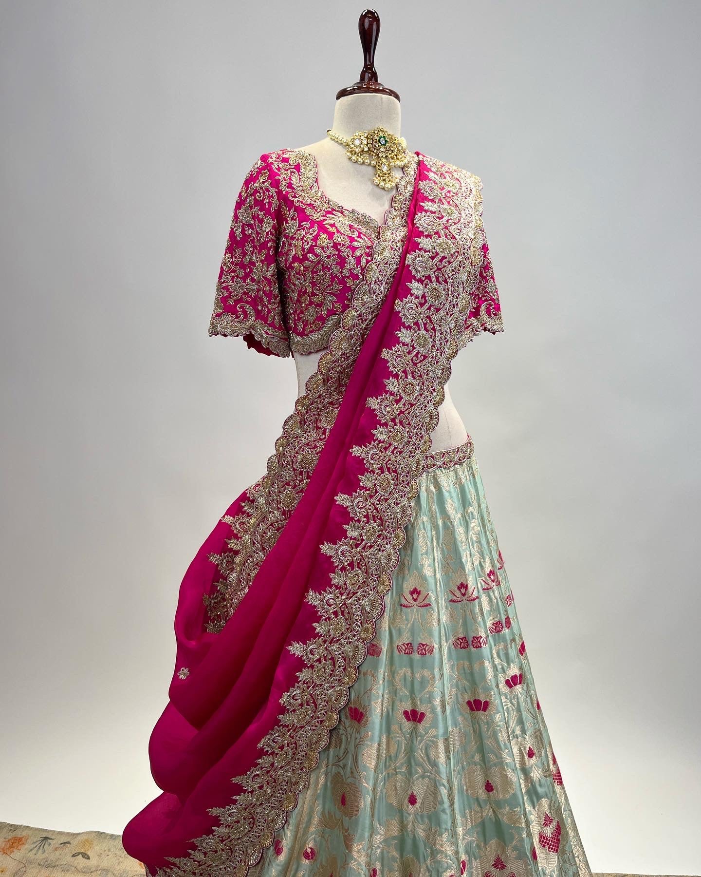 PASTEL TIFFANY BLUE BANARASI KADWA MEENA LEHENGA WITH MAGENTA DUPATTA & ZARDOSI WORK