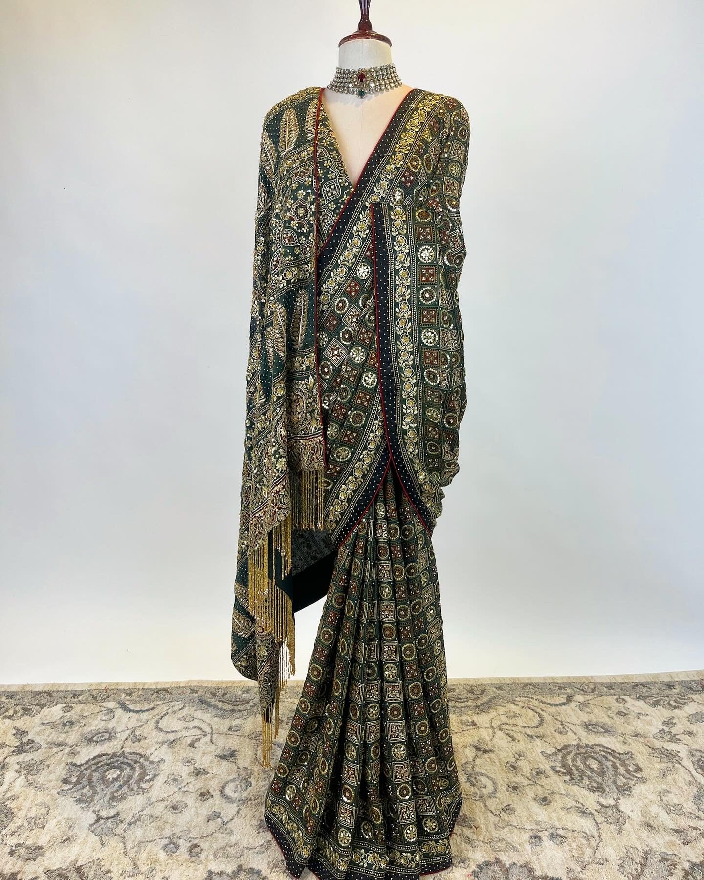 Gharchola inspired Deep Green Ajrakh Saree in Zardosi and Aari work