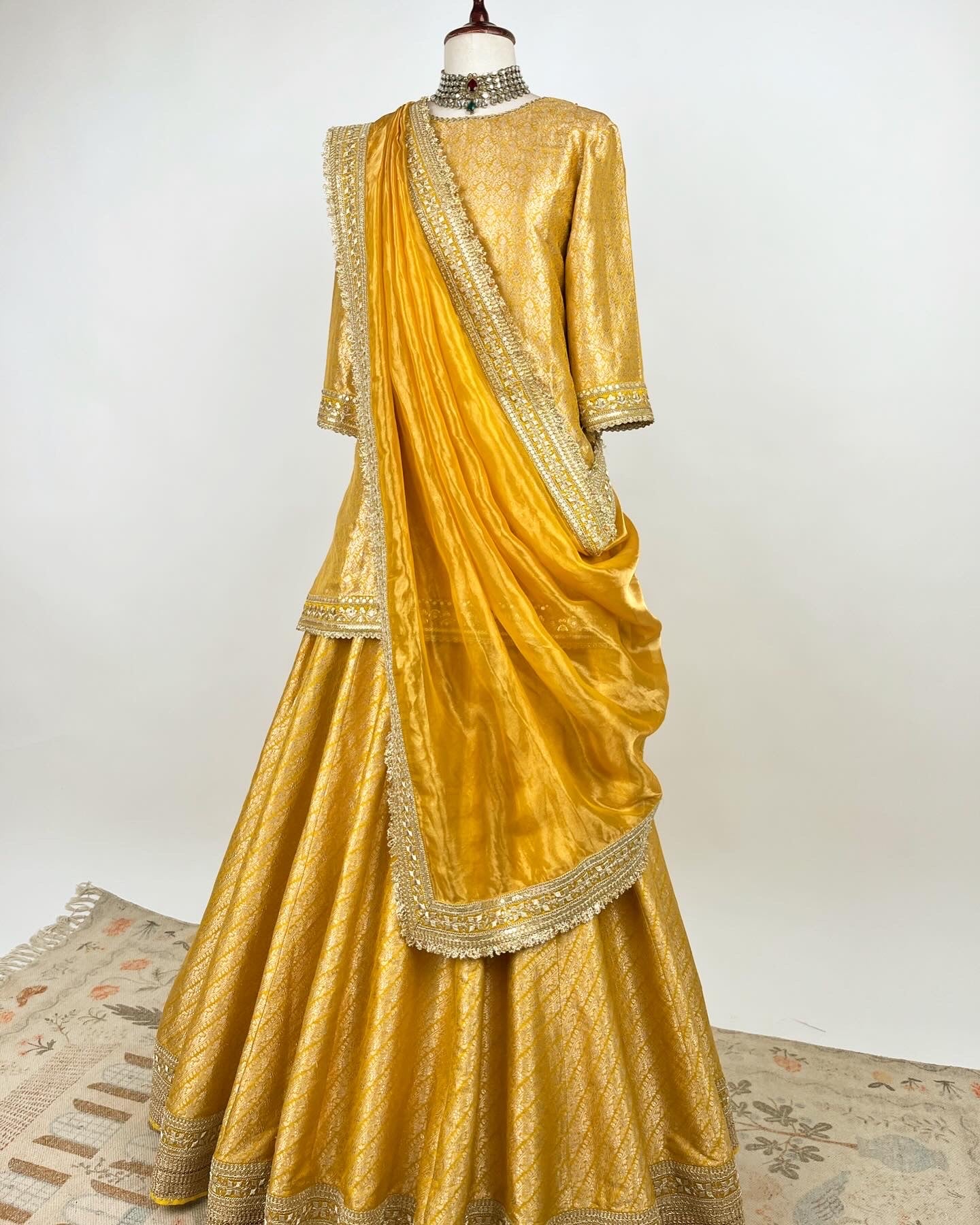 MUSTARD BROCADE LEHENGA WITH SHORT KURTA AND TISSUE DUPATTA