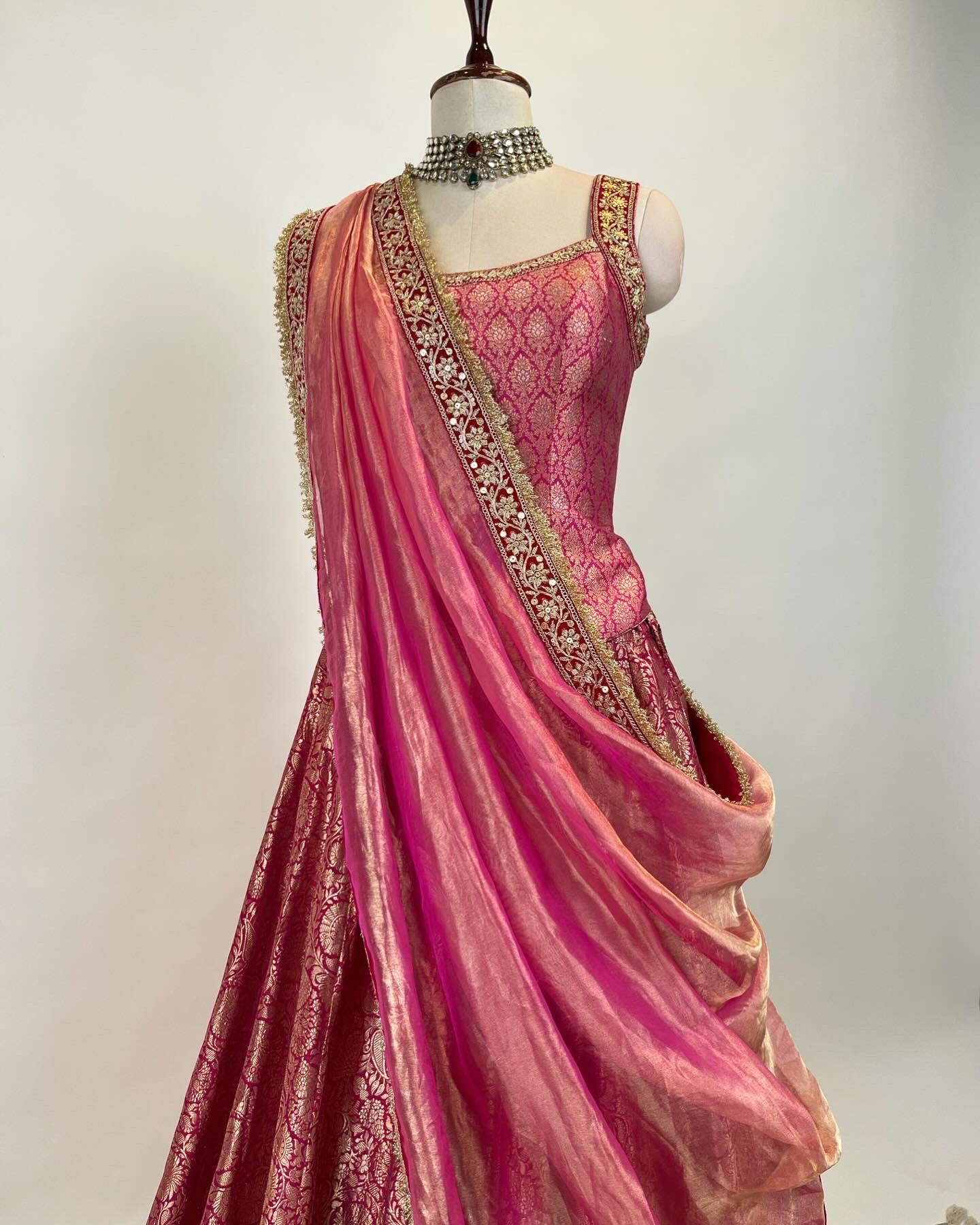 BROCADE LEHENGA WITH BACKLESS TASSLED TOP