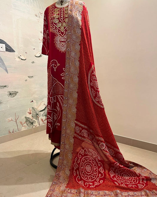 RED PICHWAI AABHA WITH EMBROIDERED RAI BANDHEJ DUPATTA