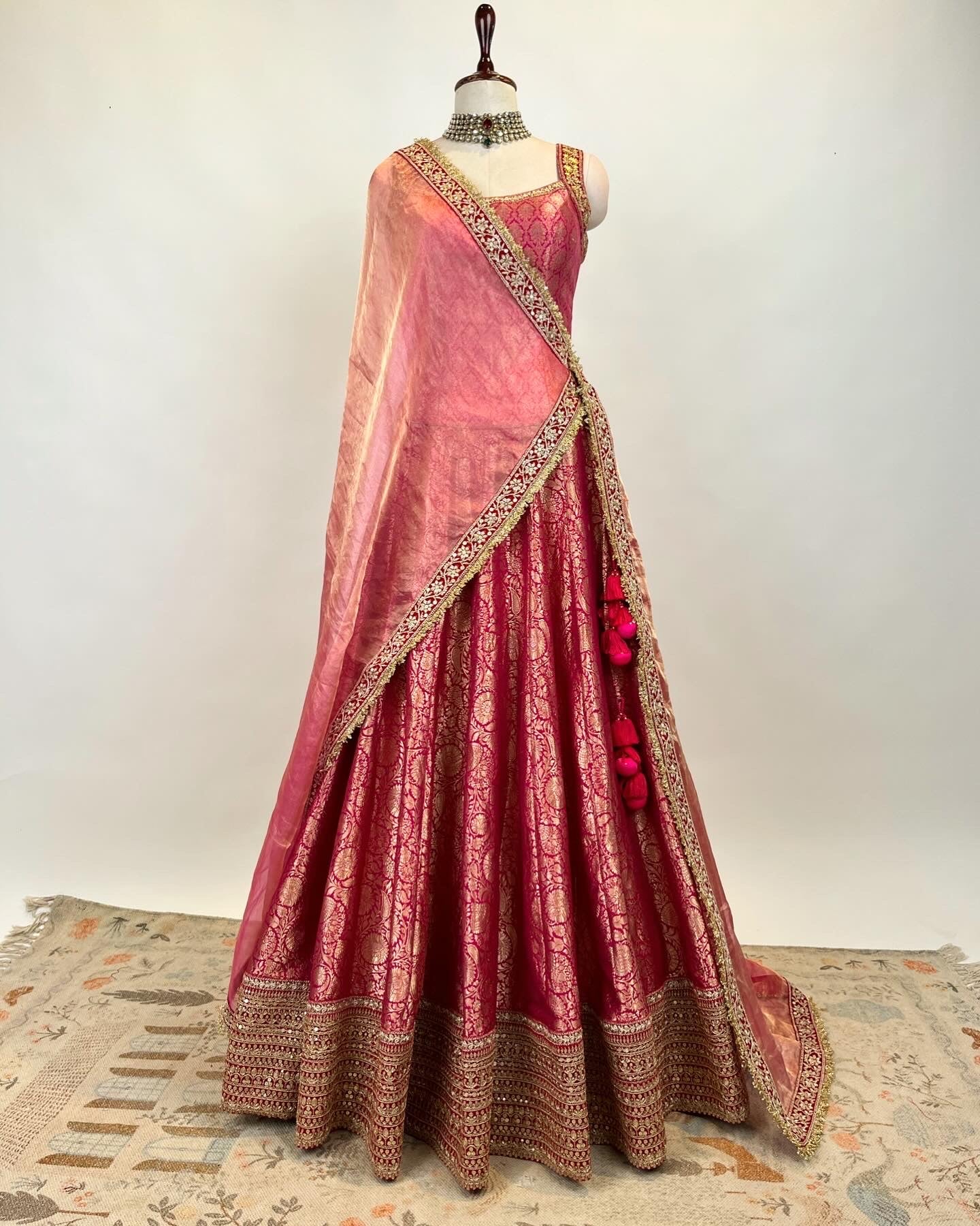 BROCADE LEHENGA WITH BACKLESS TASSLED TOP