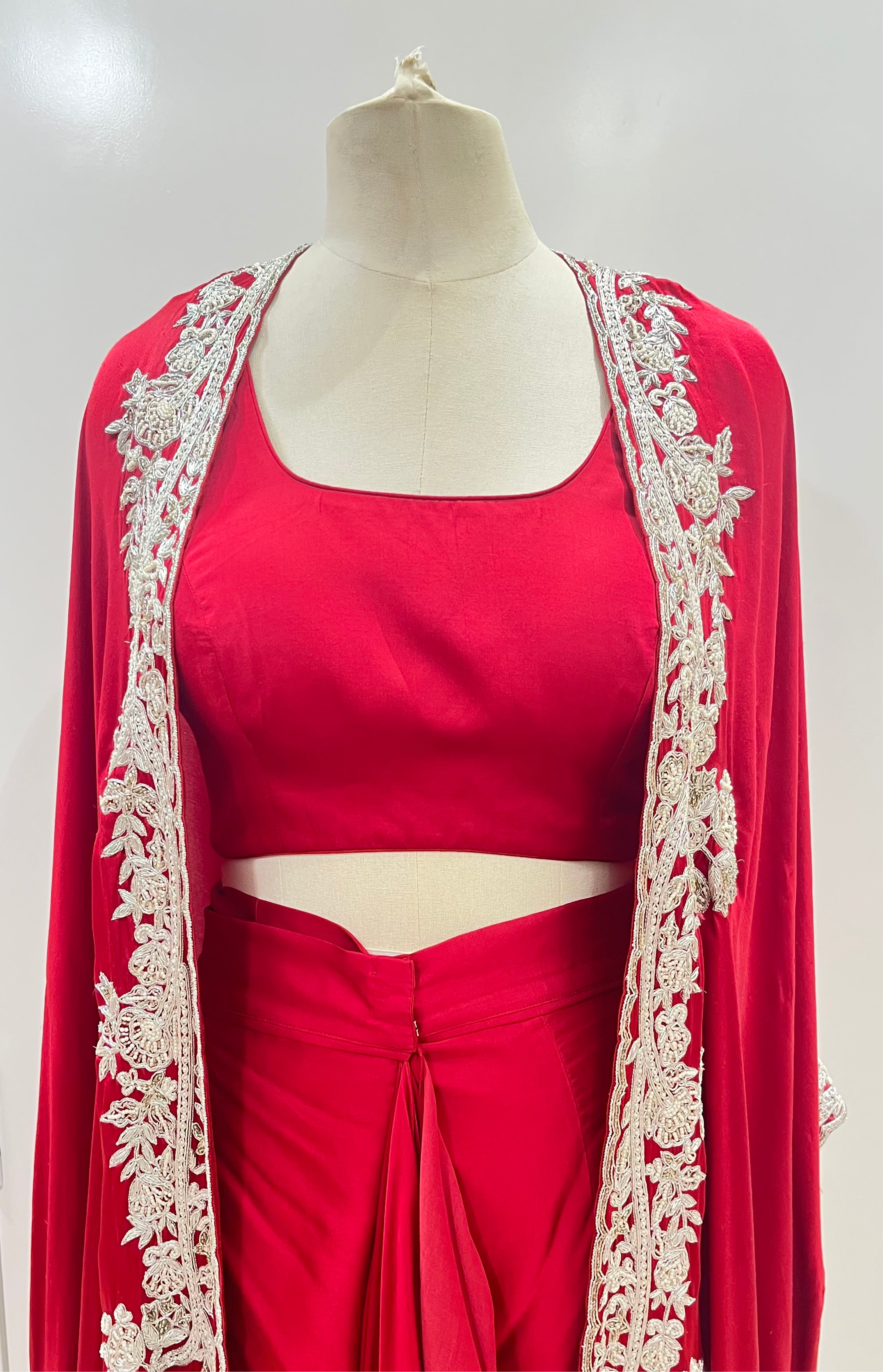 RED CAPE WITH DRAPED SKIRT AND BLOUSE