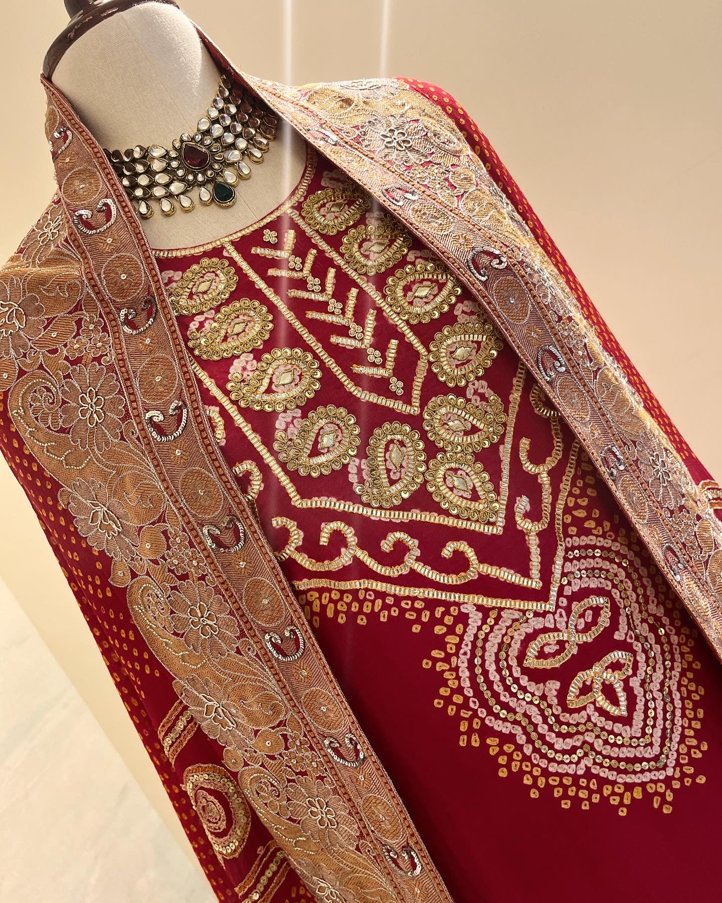 RED PICHWAI AABHA WITH EMBROIDERED RAI BANDHEJ DUPATTA