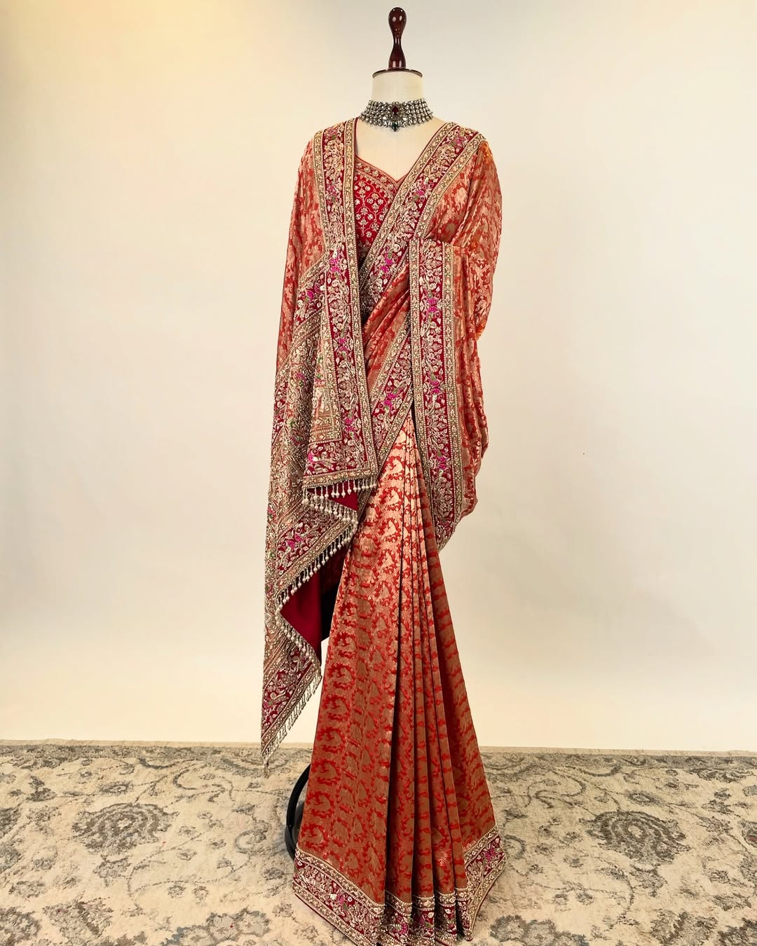 RUST ORANGE BROCADE ZARI SAREE WITH ZARDOSI FRENCH KNOT AND PEARLS AND RED EMBROIDERED BLOUSE