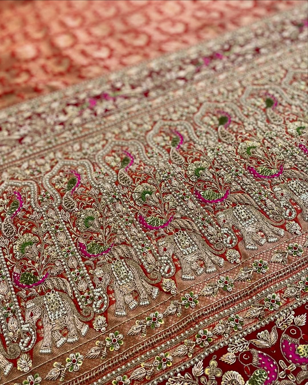 RUST ORANGE BROCADE ZARI SAREE WITH ZARDOSI FRENCH KNOT AND PEARLS AND RED EMBROIDERED BLOUSE